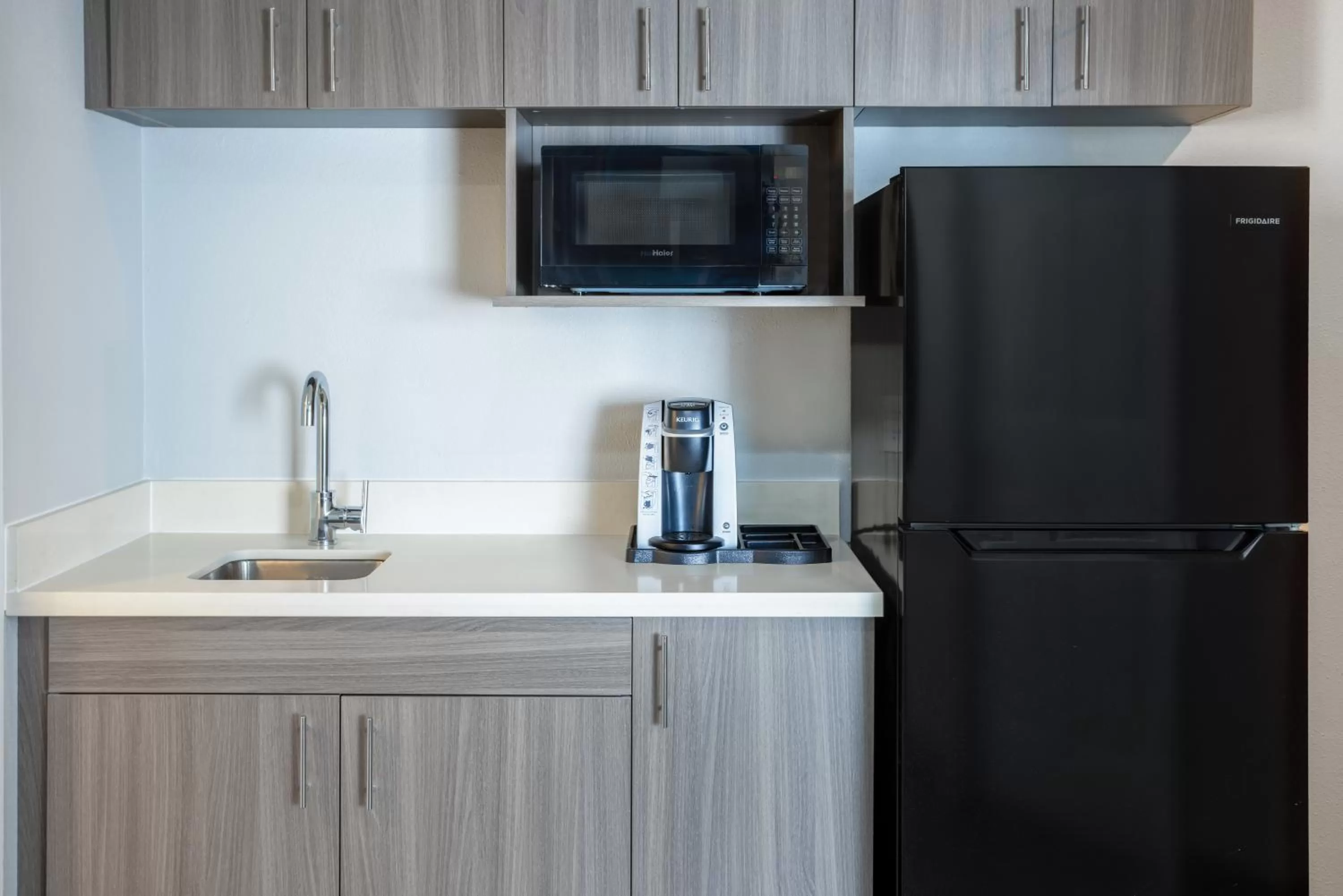 Kitchen or kitchenette in Holiday Inn Express and Suites Tampa I-75 at Bruce B. Downs by IHG