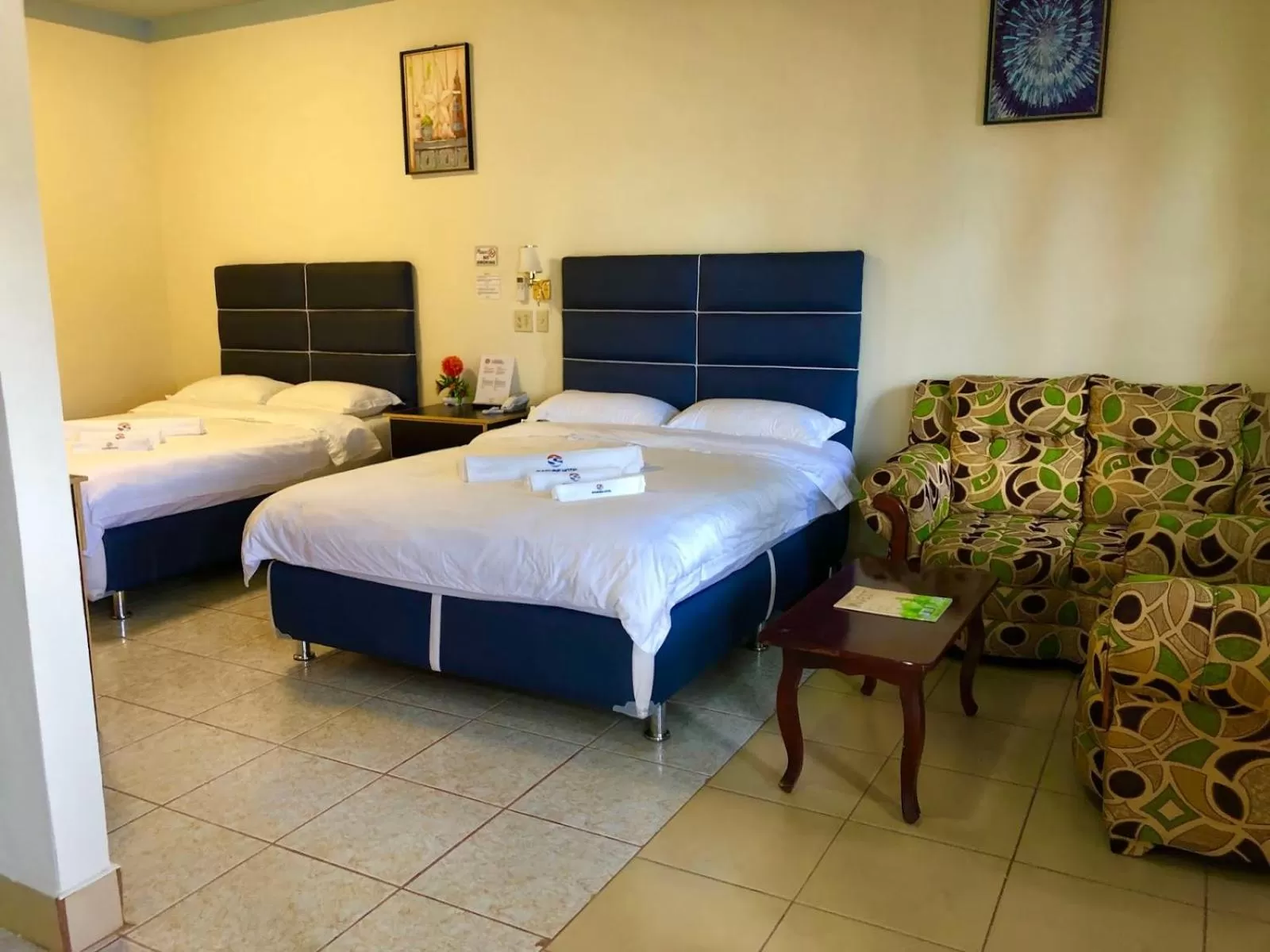 Bed in Sunshine View Hotel and Restaurant