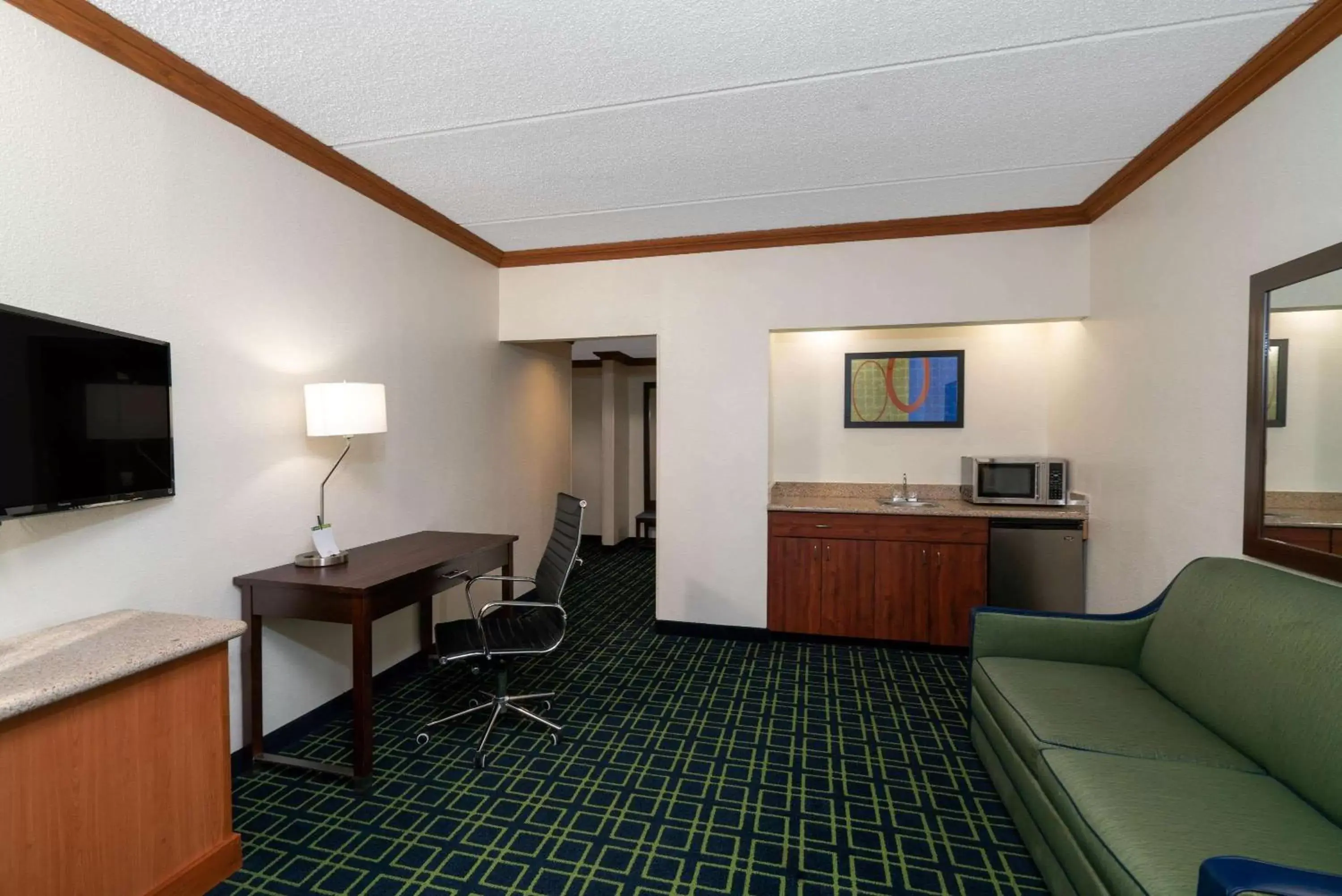 Photo of the whole room, Seating Area in Wingate by Wyndham Fletcher at Asheville Airport