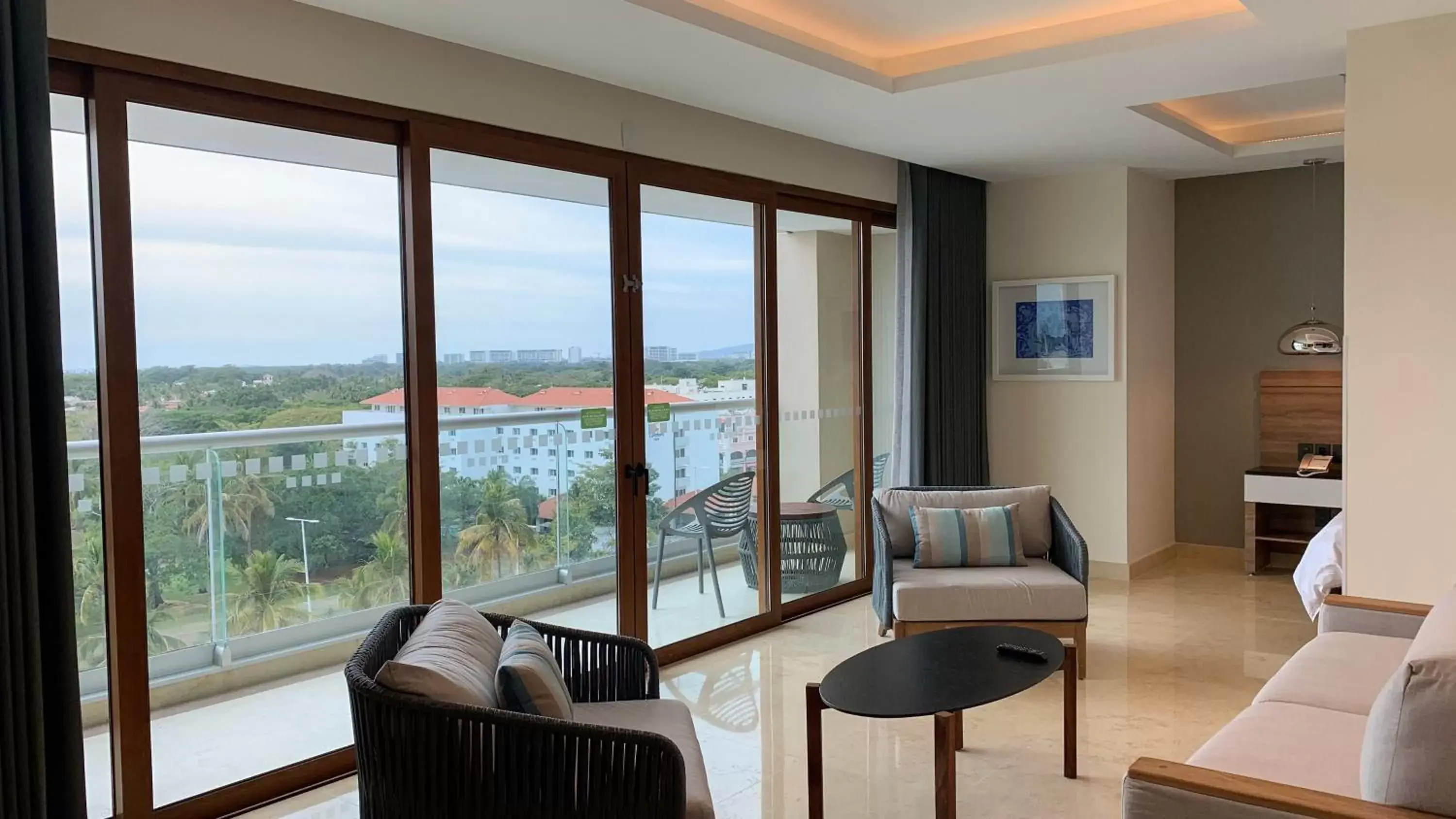 Photo of the whole room, Seating Area in Holiday Inn & Suites - Puerto Vallarta Marina & Golf, an IHG Hotel
