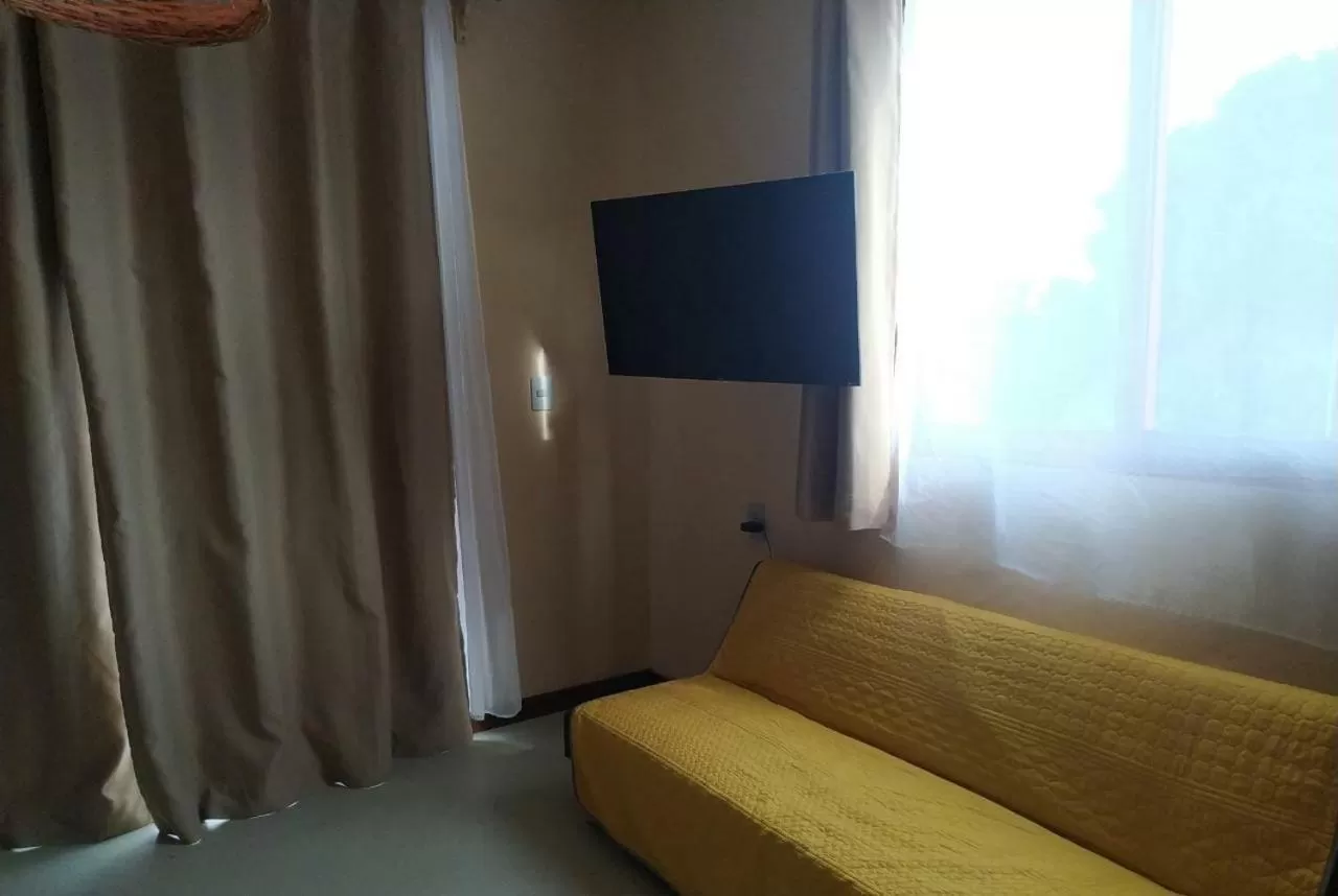 Communal lounge/ TV room in Hotel Sur Bacalar