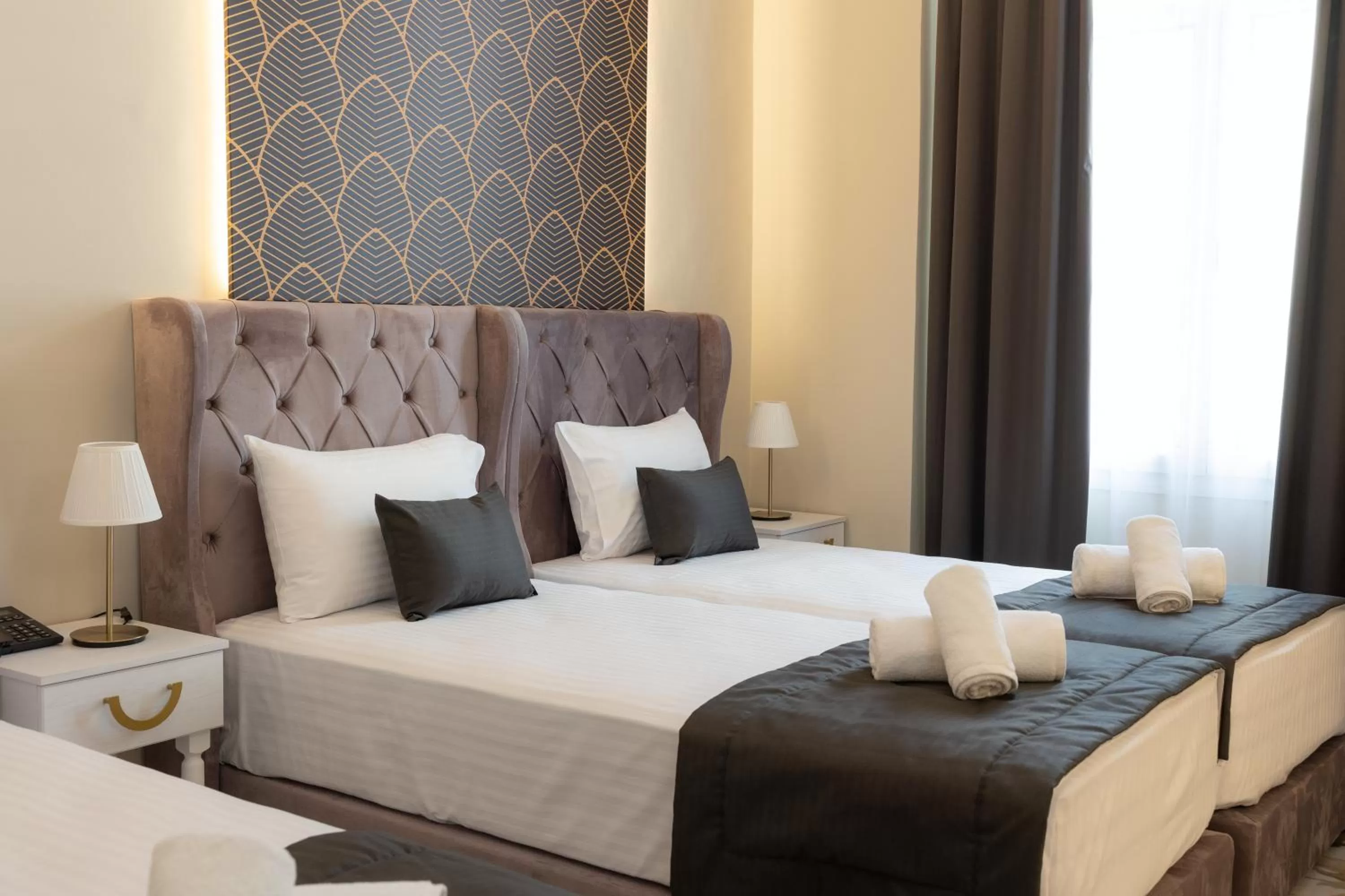 Bed in Modern Revival Luxury Hotel