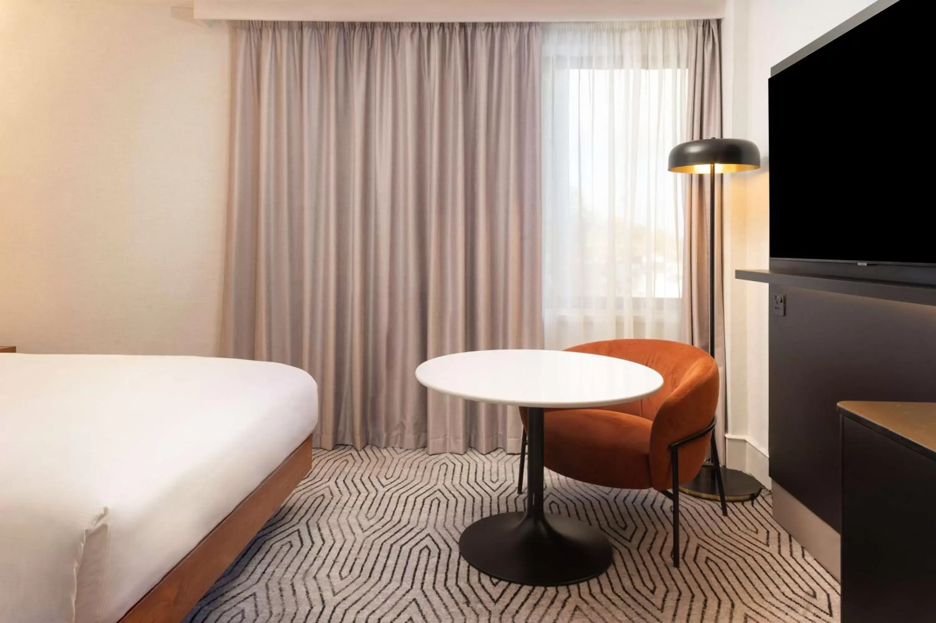 Bedroom, Seating Area in Hilton London Olympia