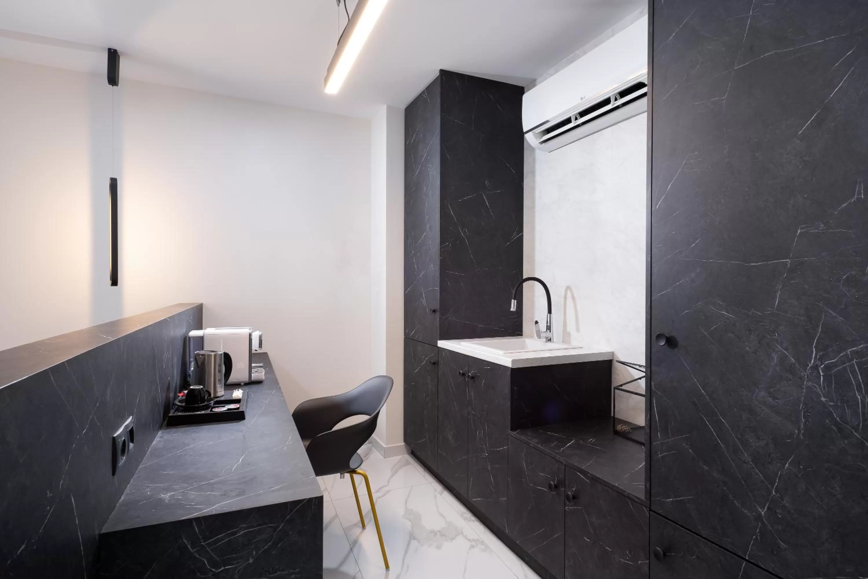 Kitchen or kitchenette in Enattica Suites