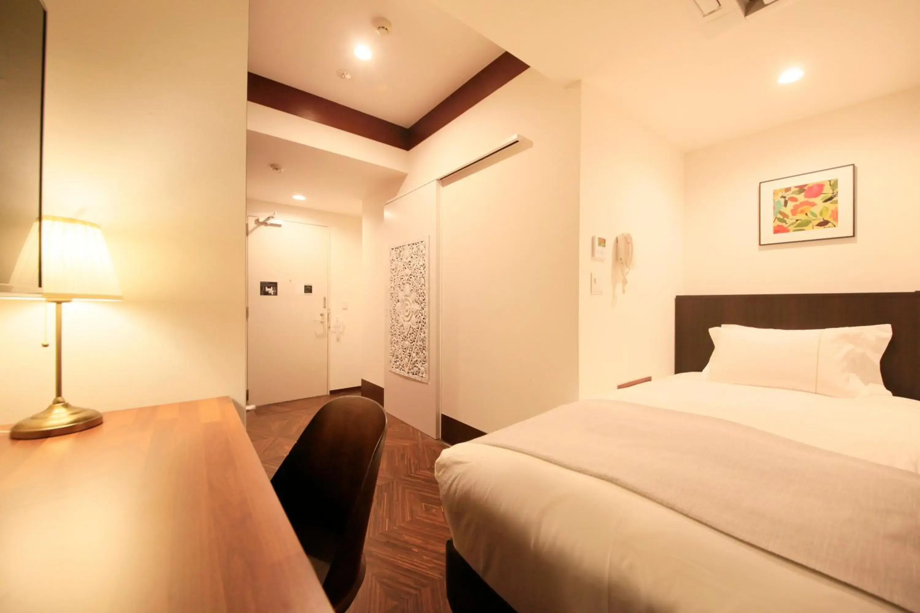 Photo of the whole room, Bed in Centurion Hotel Residential Akasaka Station