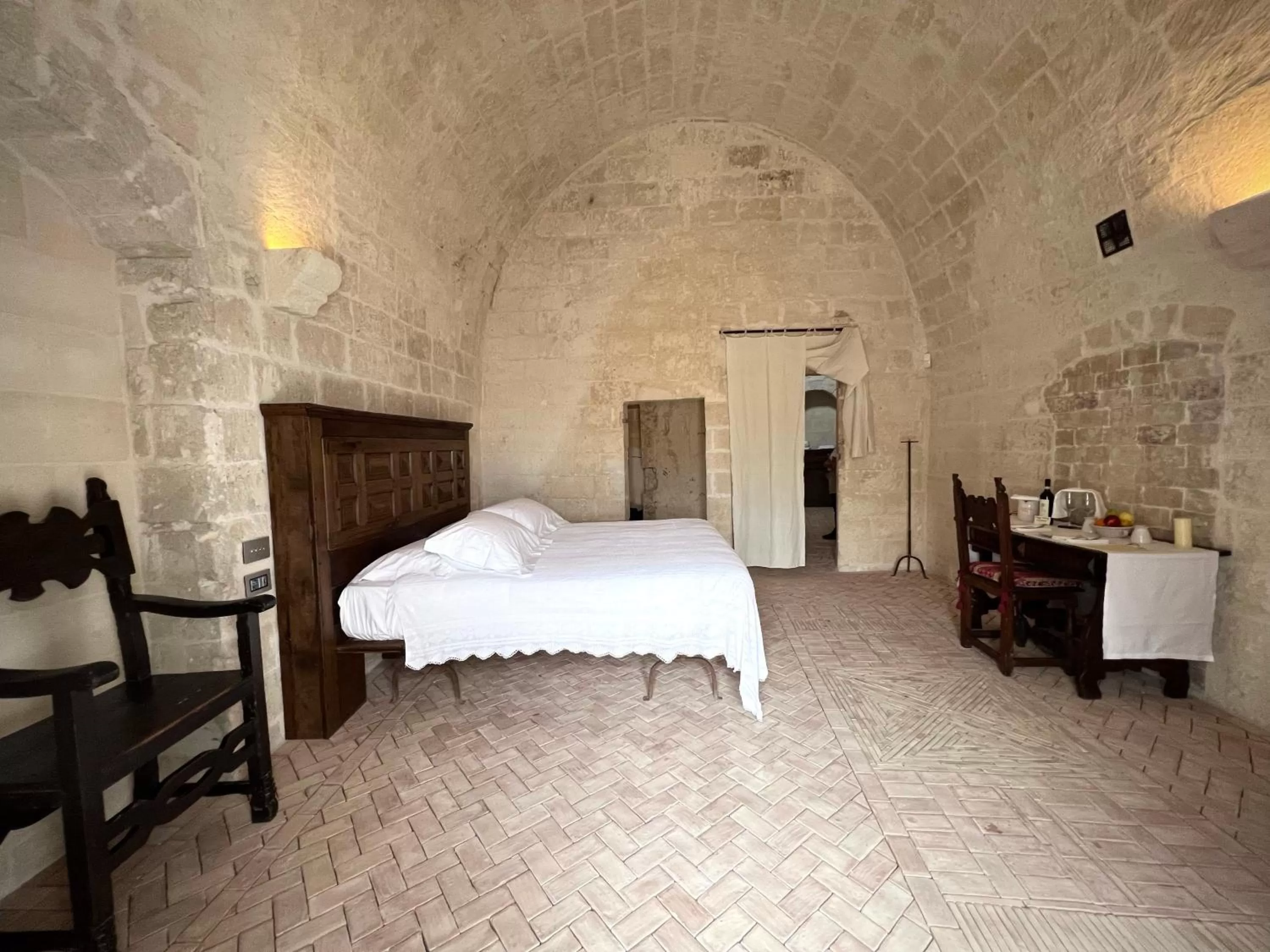 Bedroom in Sextantio Le Grotte Della Civita