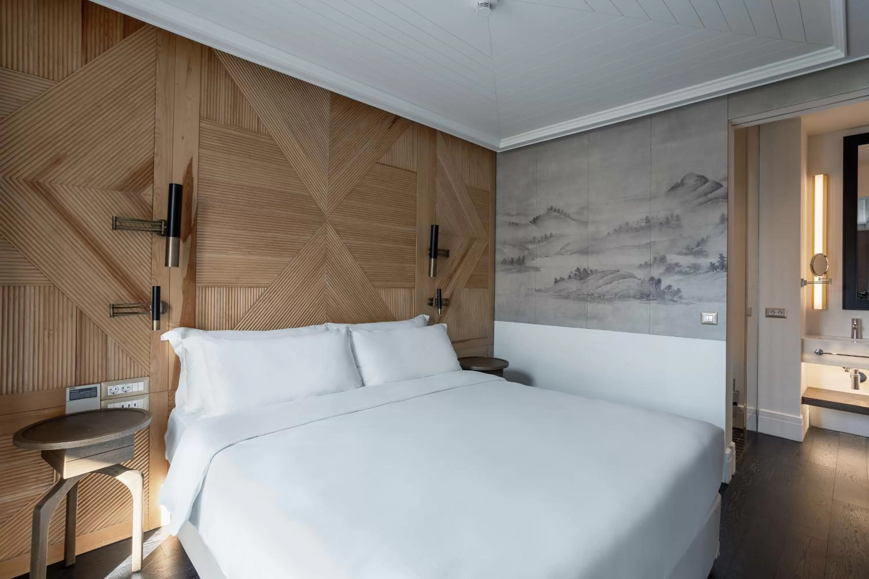 Bed in The Wings Hotels Collection