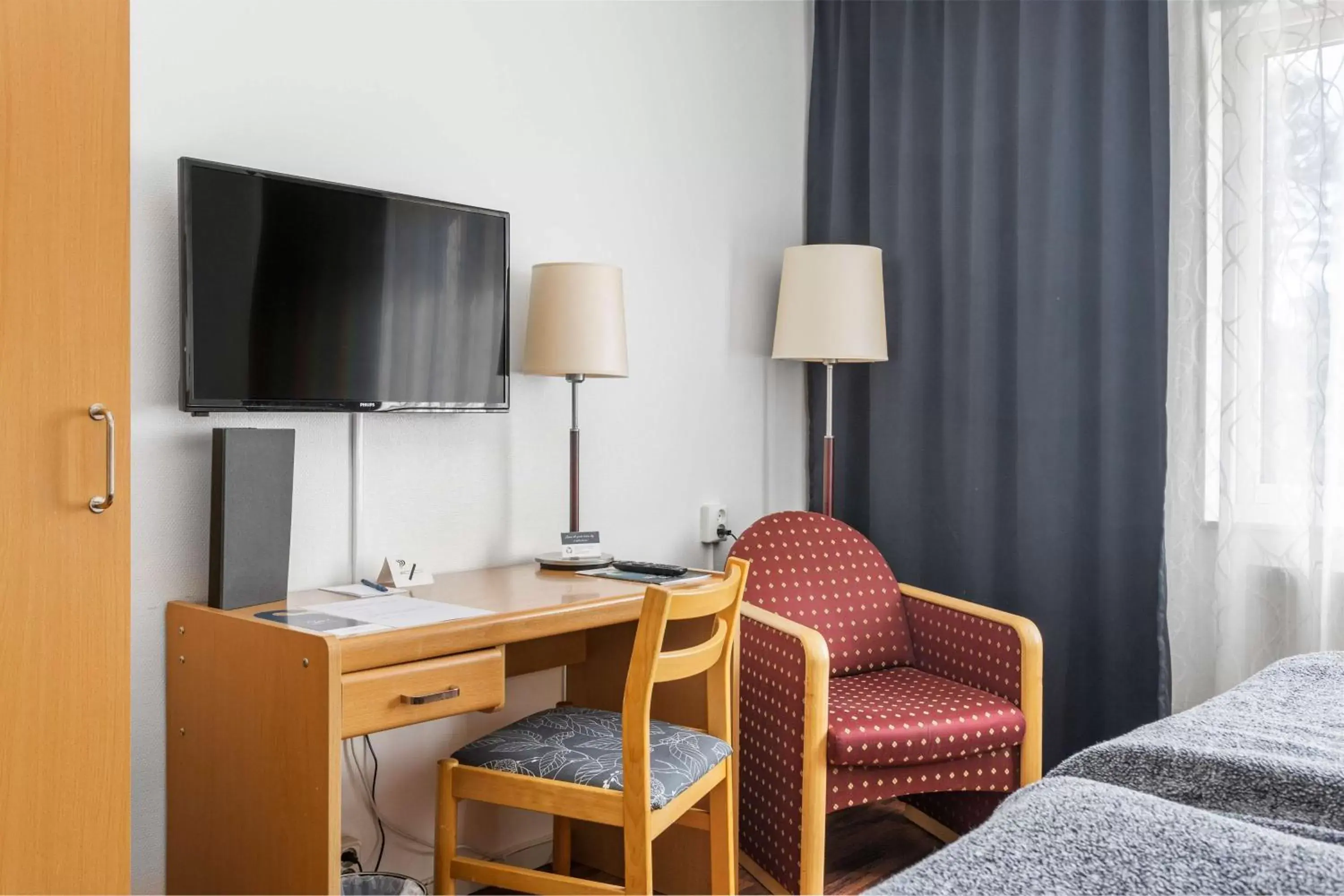 Bedroom, TV/Entertainment Center in Hotell Frykenstrand; Sure Hotel Collection by Best Western