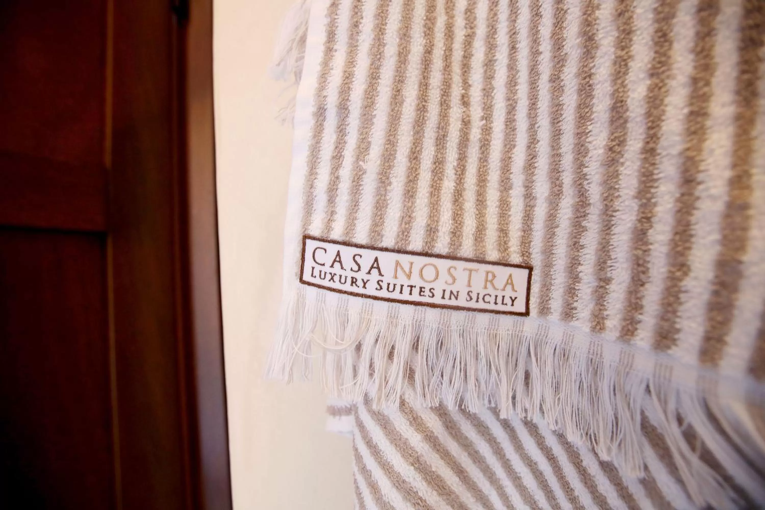 Property logo or sign in Casa Nostra Luxury Suites & Spa