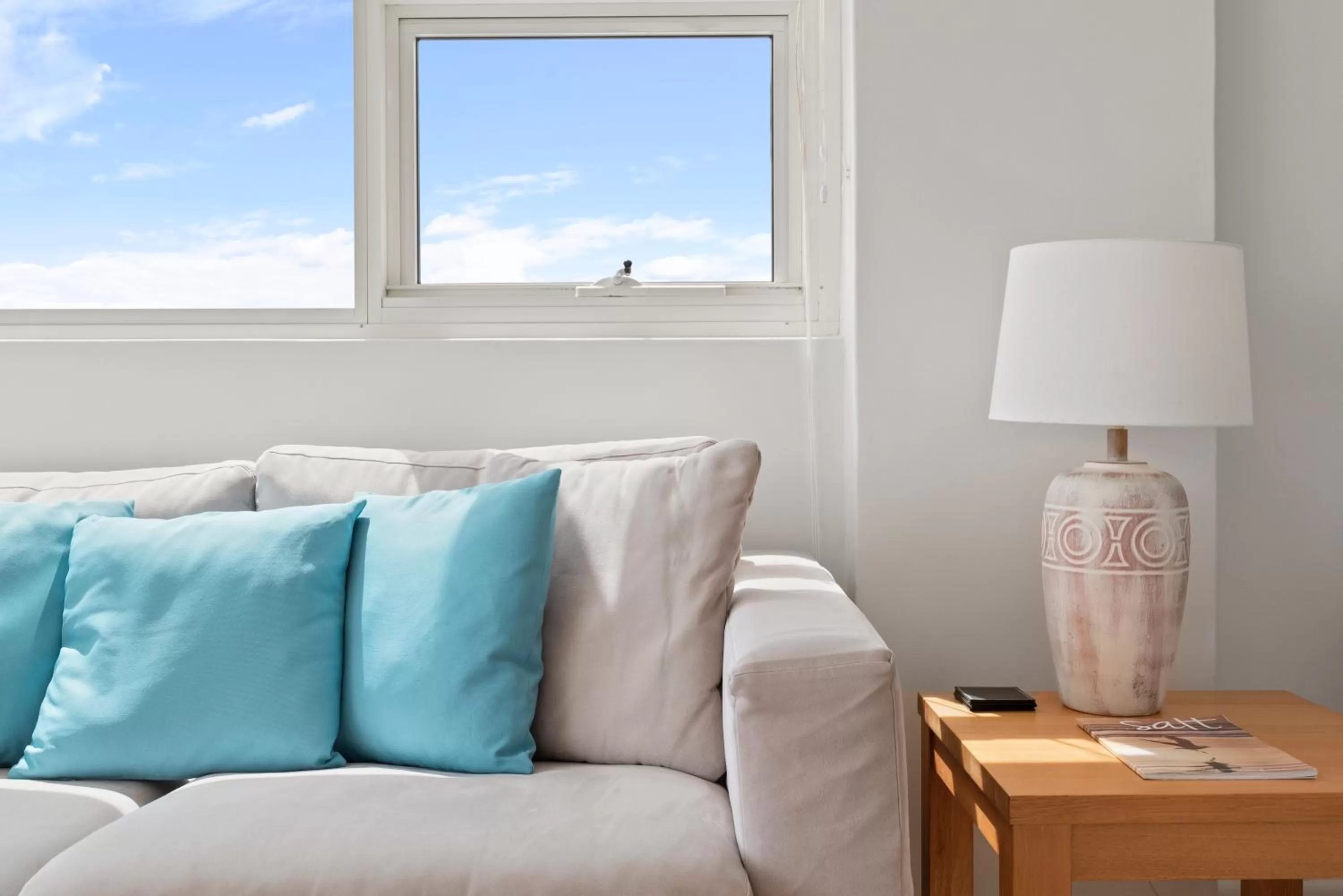 Seating area in 84 The Spit Holiday Apartments