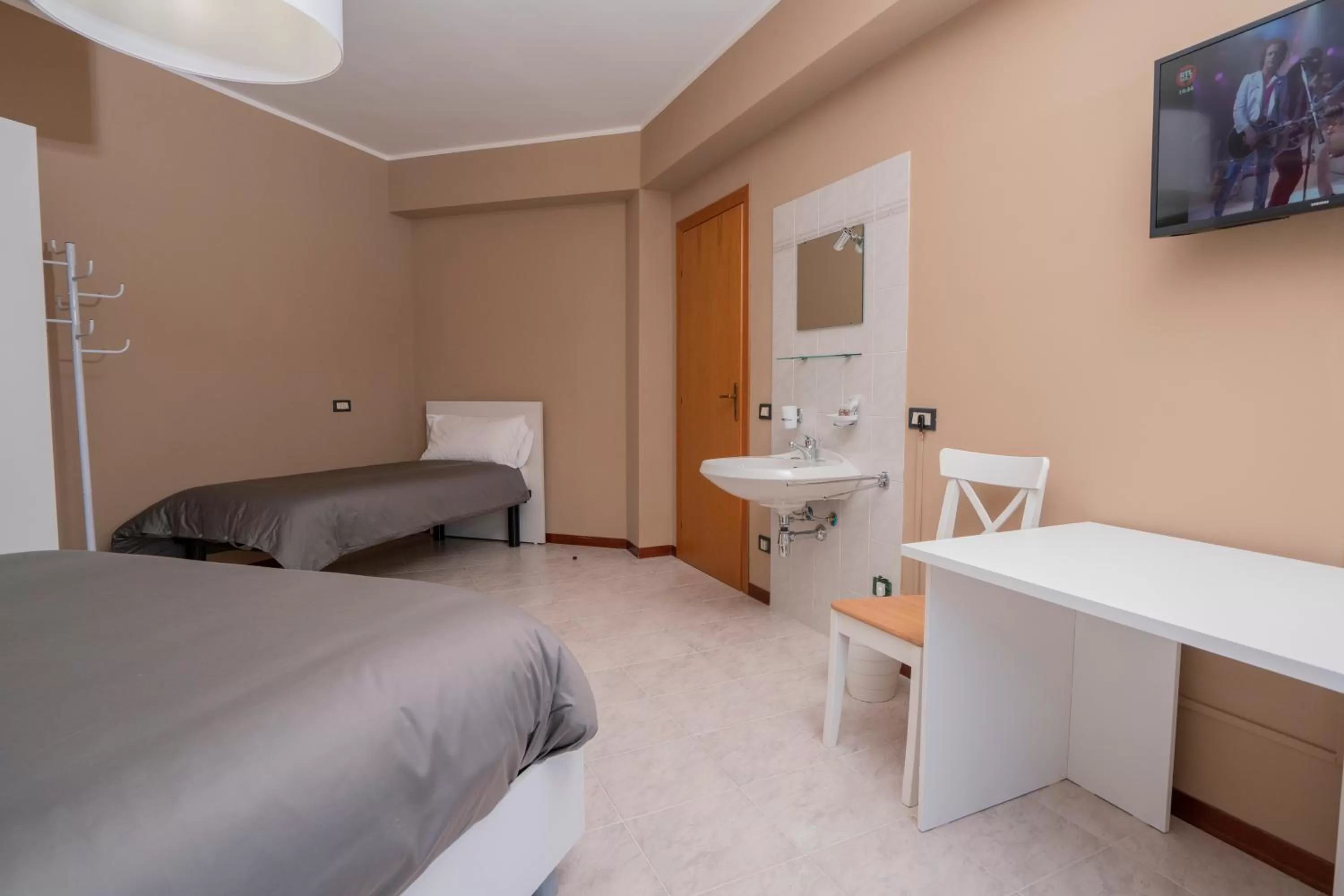 Bed in Gerosa Guest House