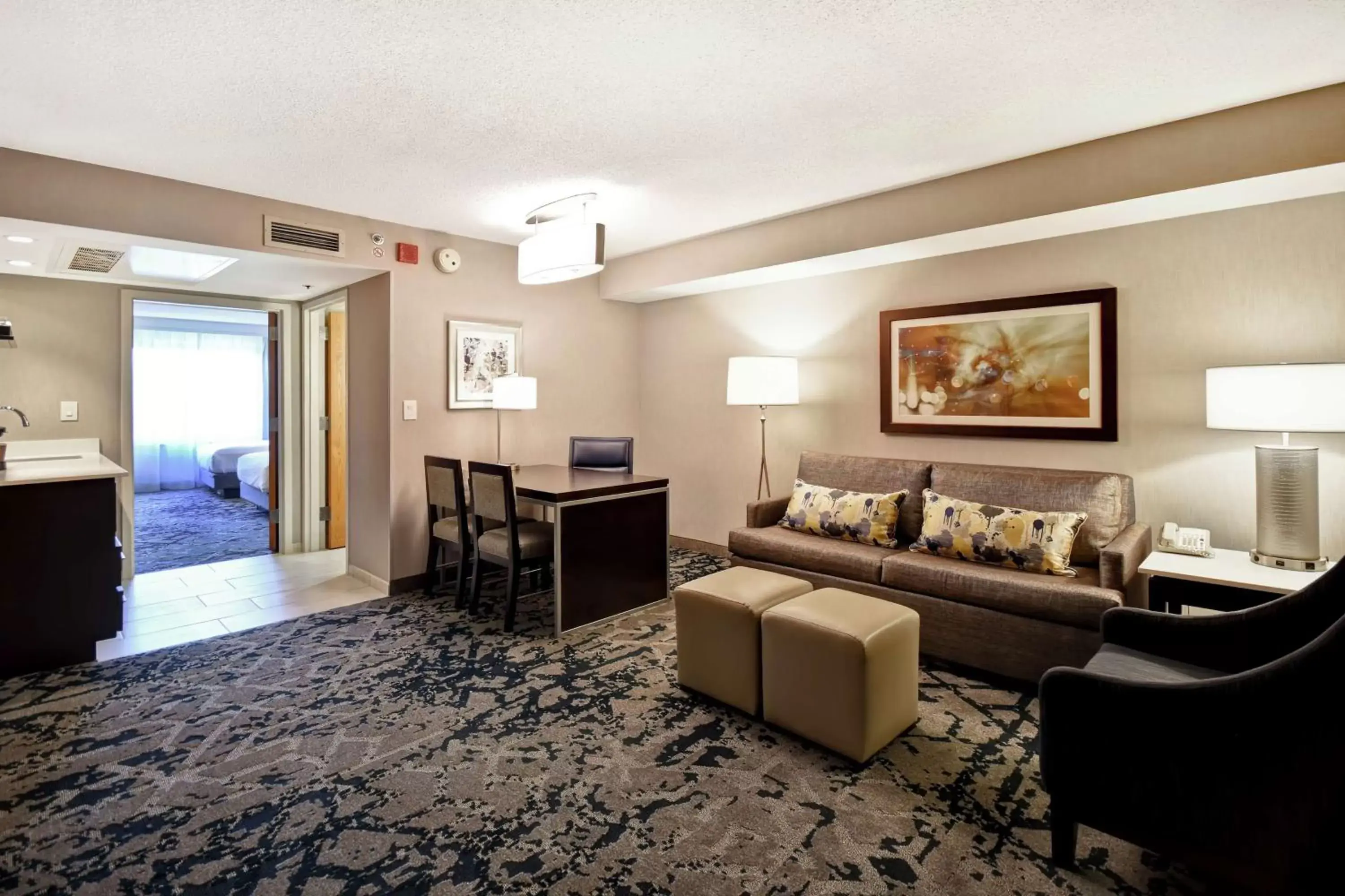 Bedroom, Seating Area in Embassy Suites by Hilton Raleigh Durham Research Triangle