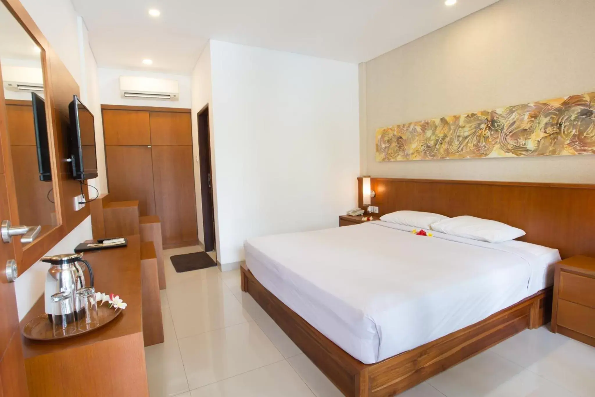 Bed, Room Photo in Sinar Bali Hotel