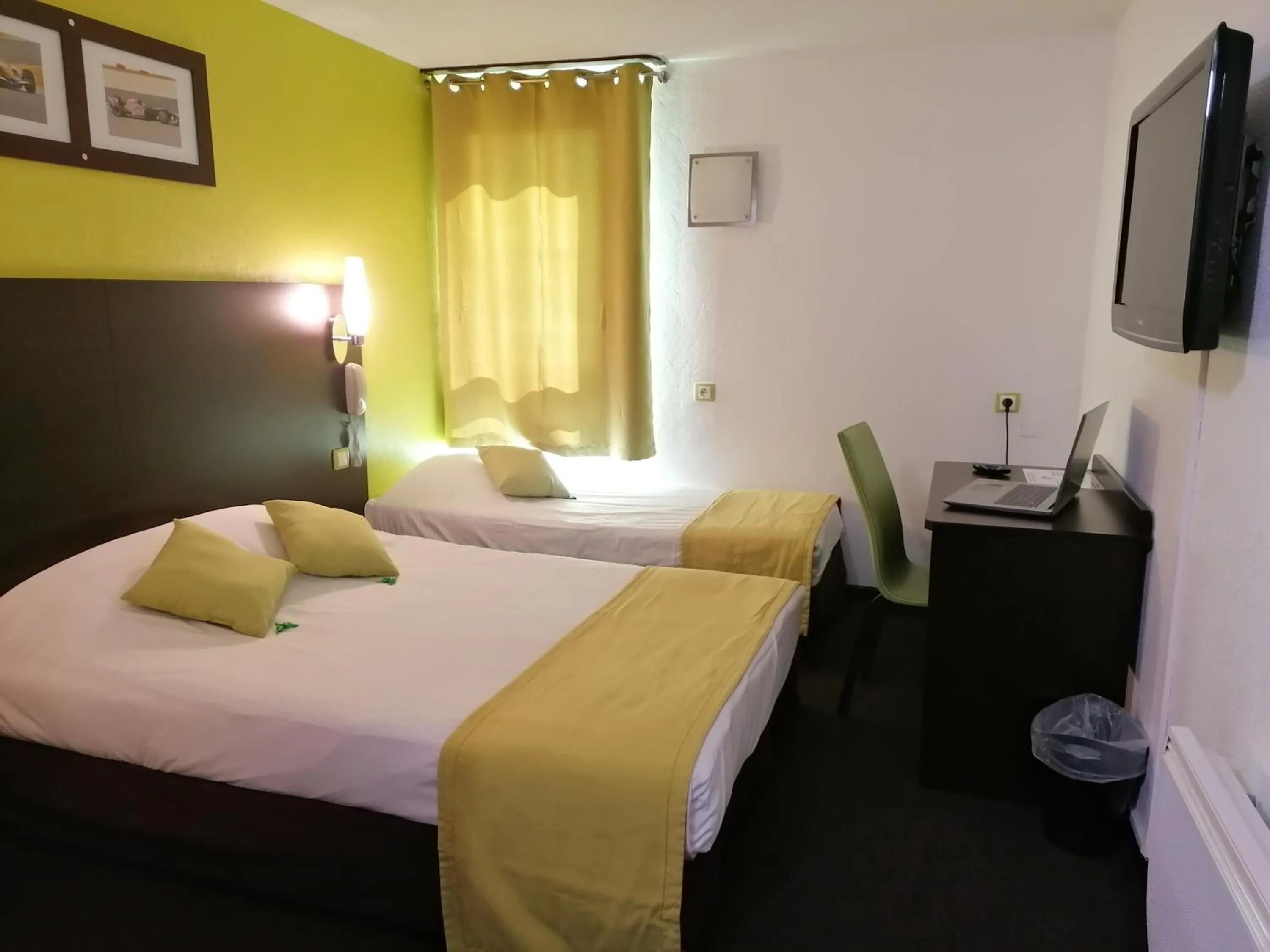 Photo of the whole room, Bed in Enzo Hotels Vierzon by Kyriad Direct