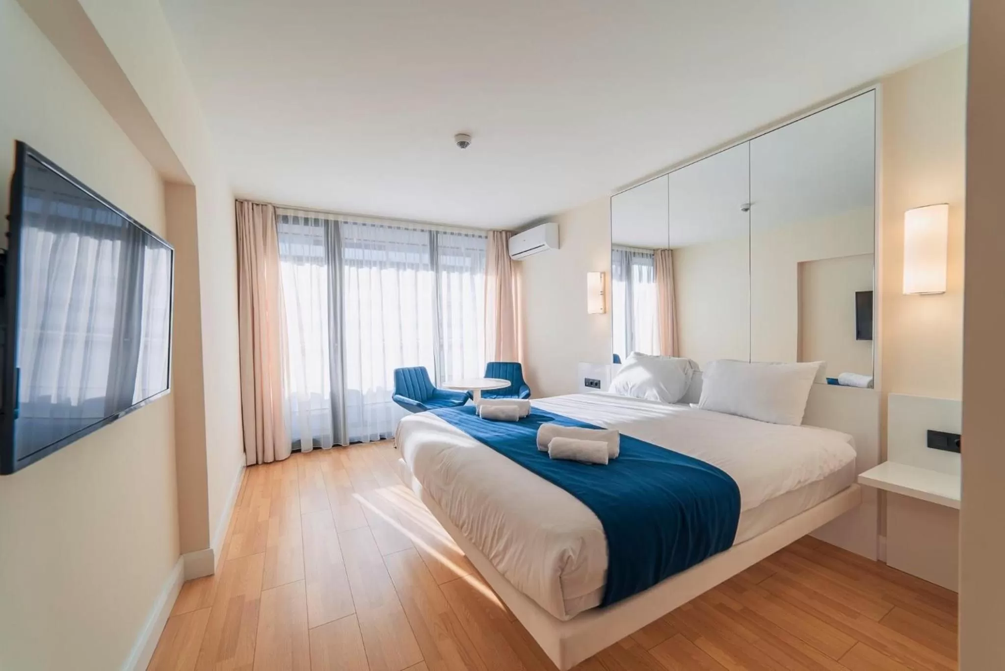 Bed in Orbi City Luxury Suite