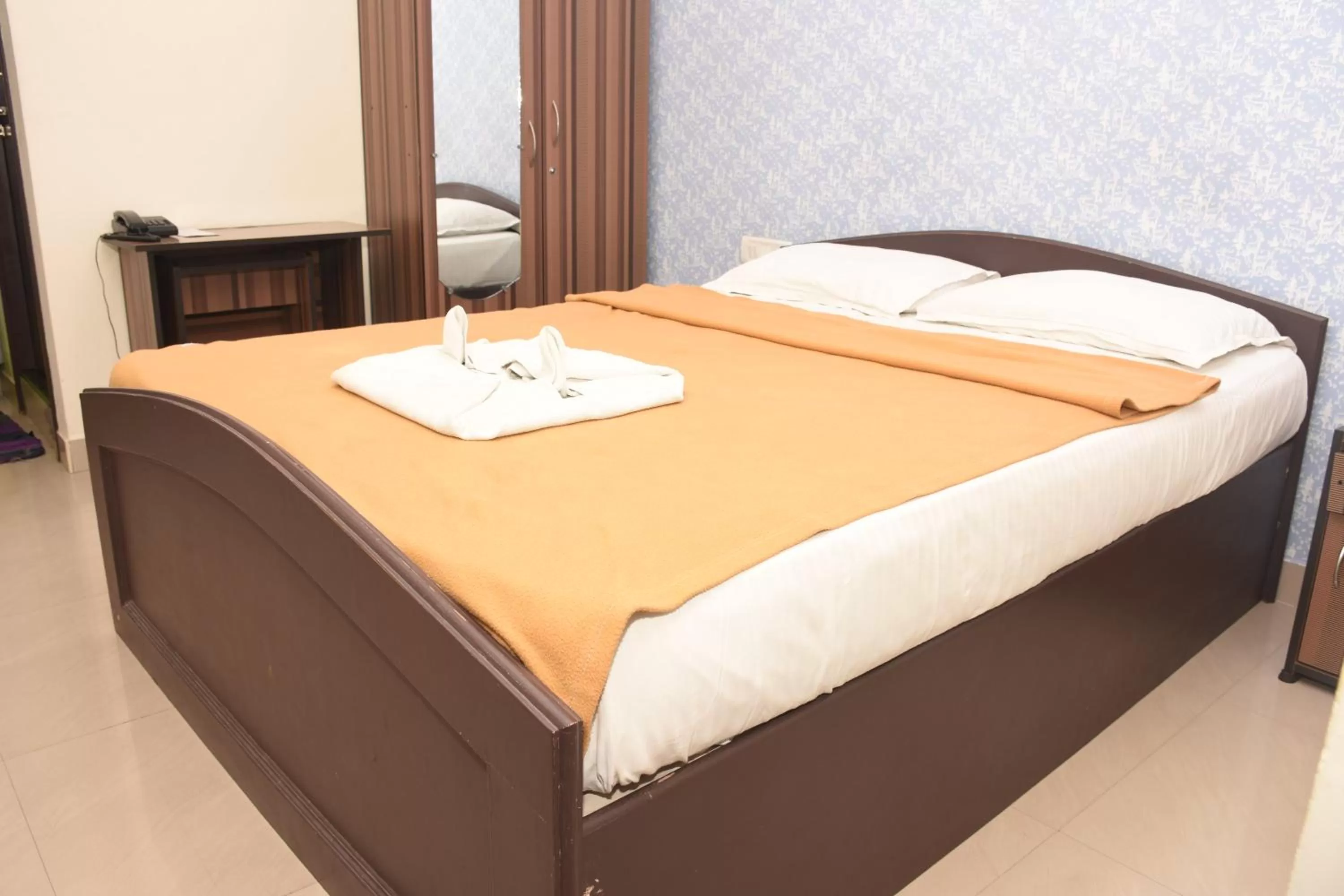 Bed in Star MSR Residency