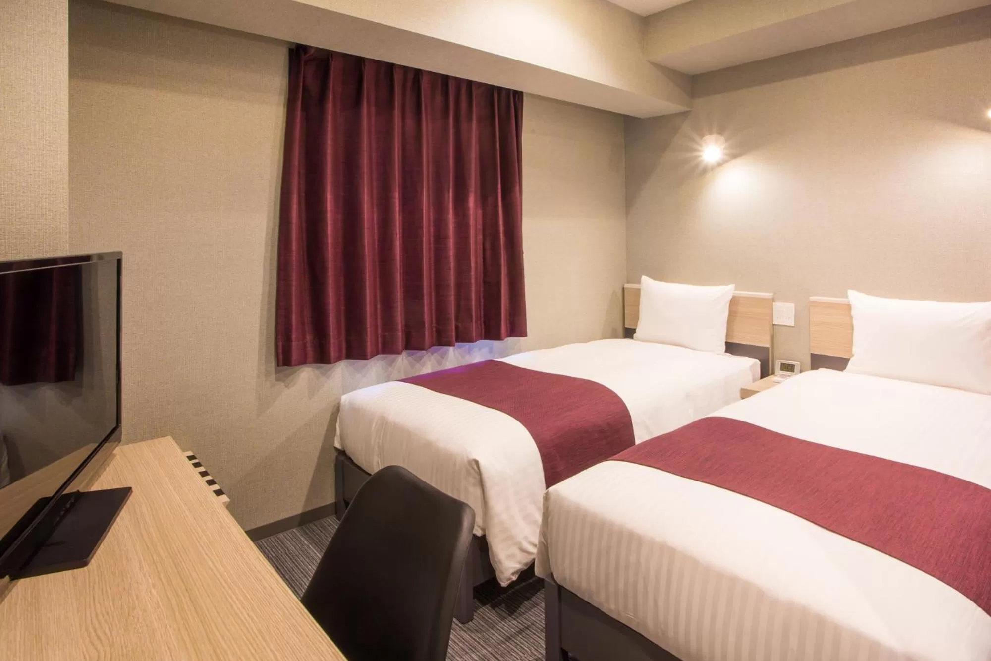 Bed in Kuretake Inn Nagoya Hisayaodori