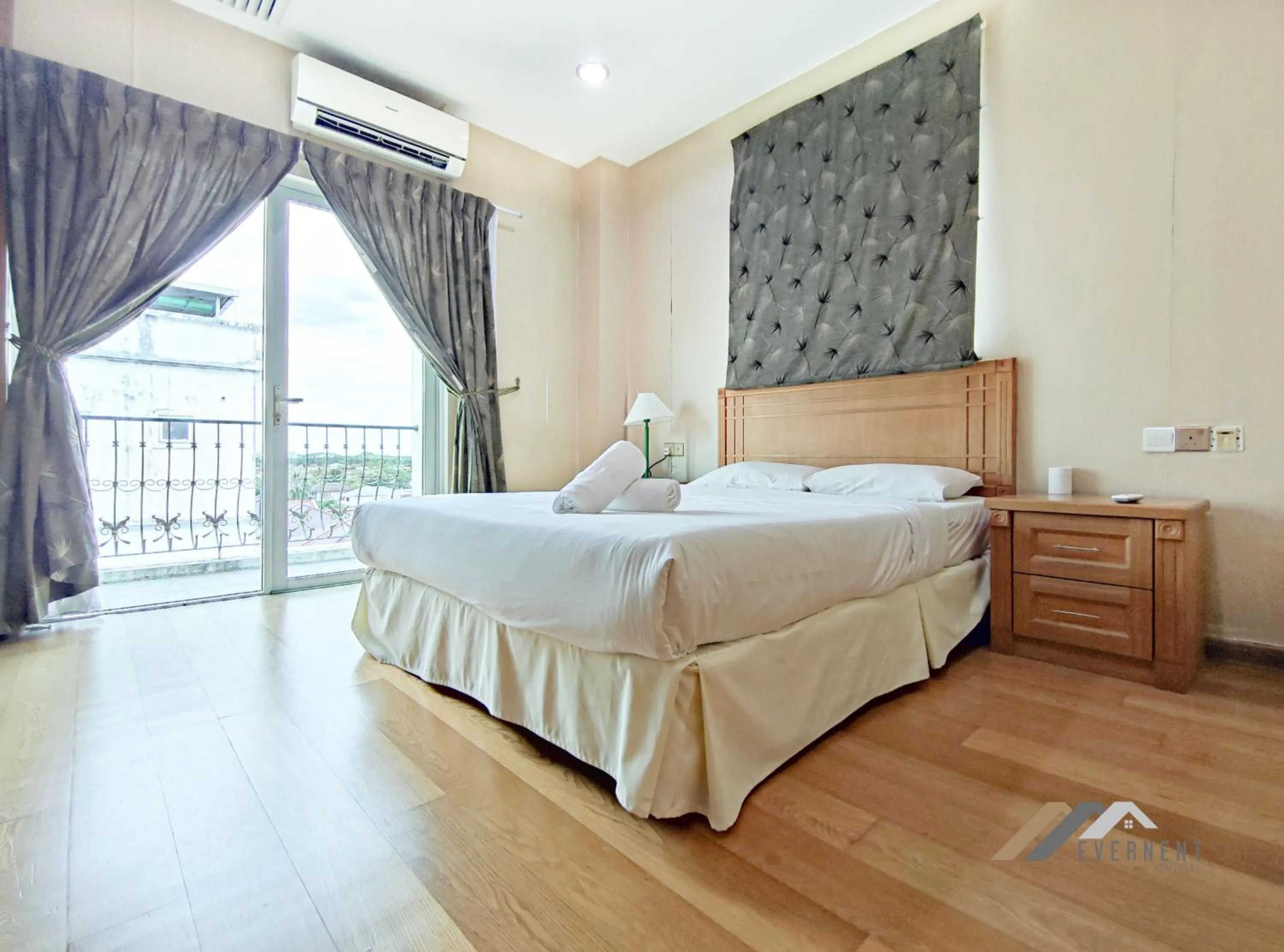 Bed in Mciti Suites by Evernent