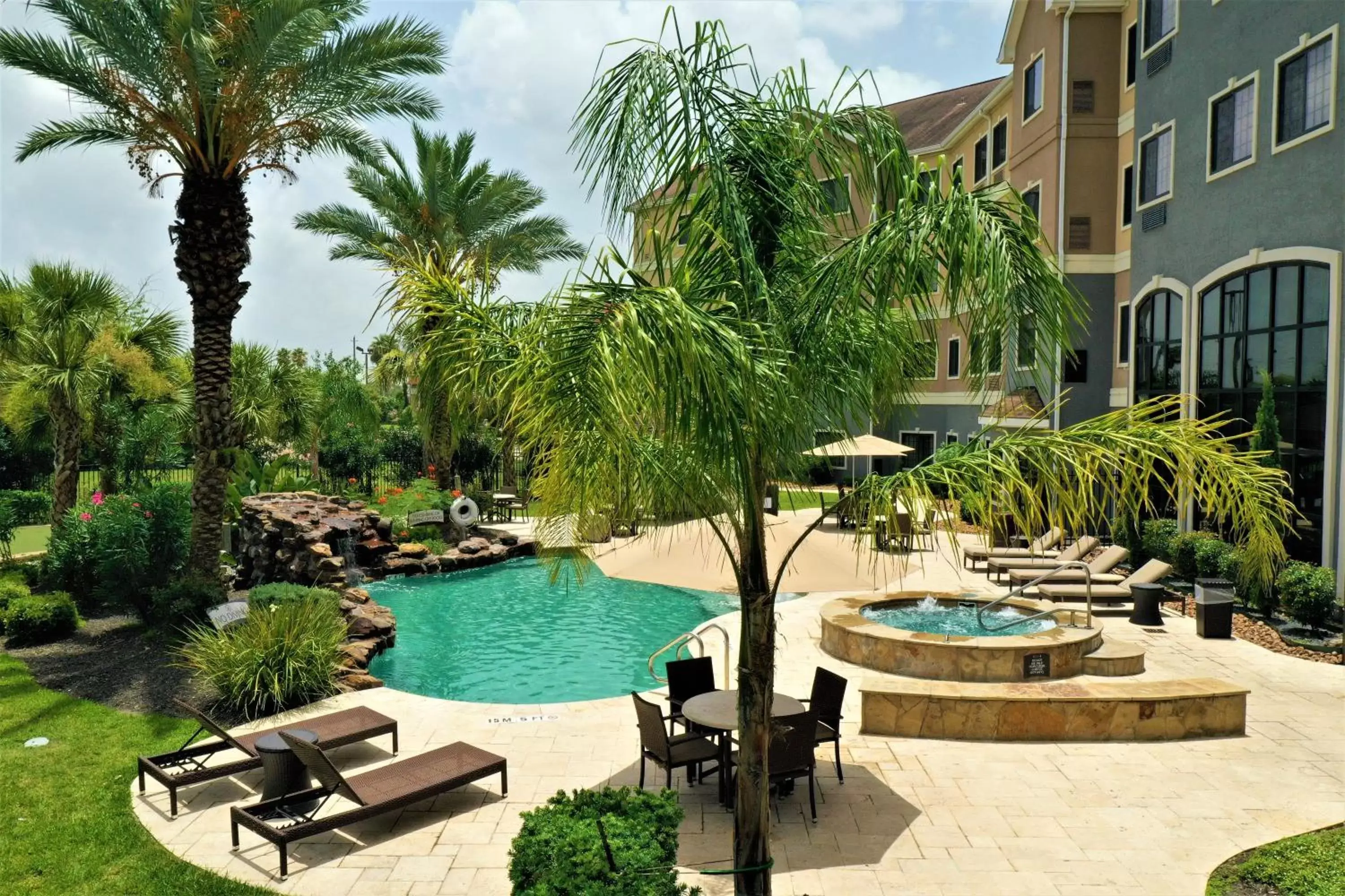 Property building, Swimming Pool in Staybridge Suites Houston-NASA Clear Lake, an IHG Hotel