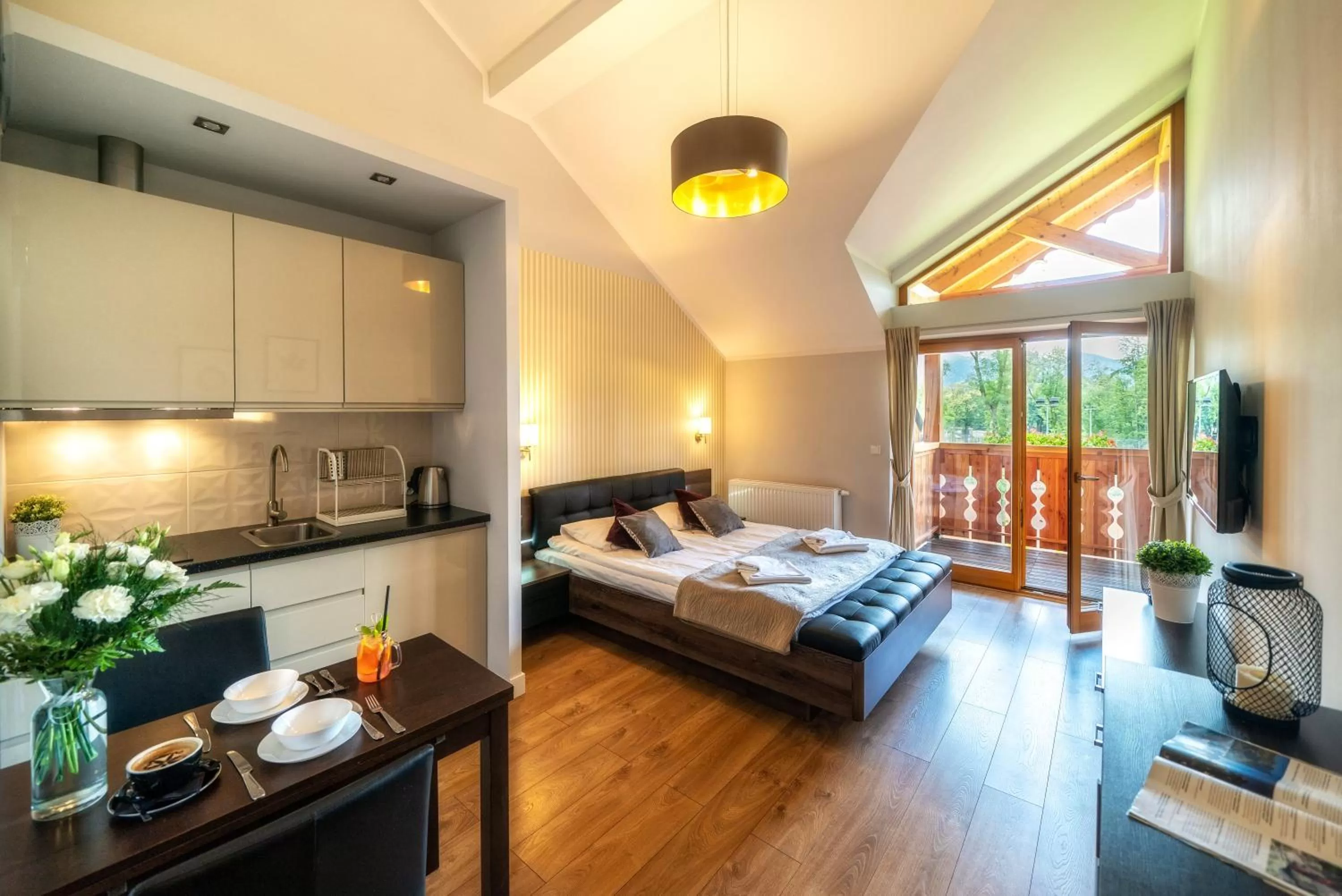 Kitchen or kitchenette, Bed in Aparthotel Giewont