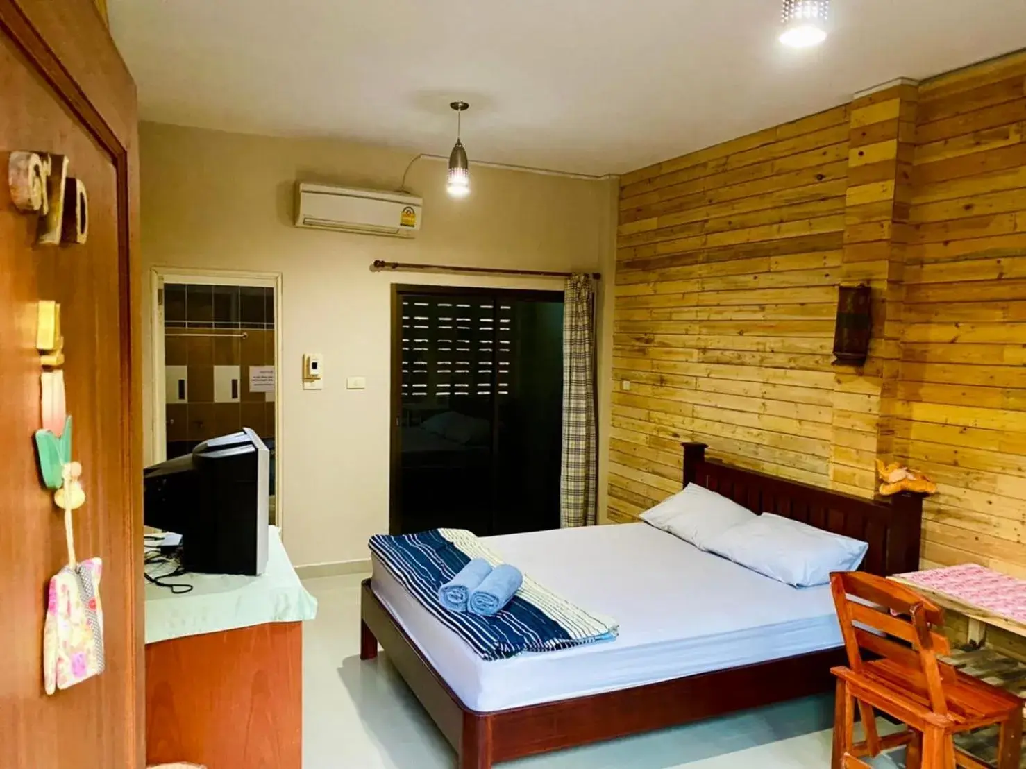 Photo of the whole room, Bed in Thai Guesthouse Photo of the whole room, Bed in Thai Guesthouse