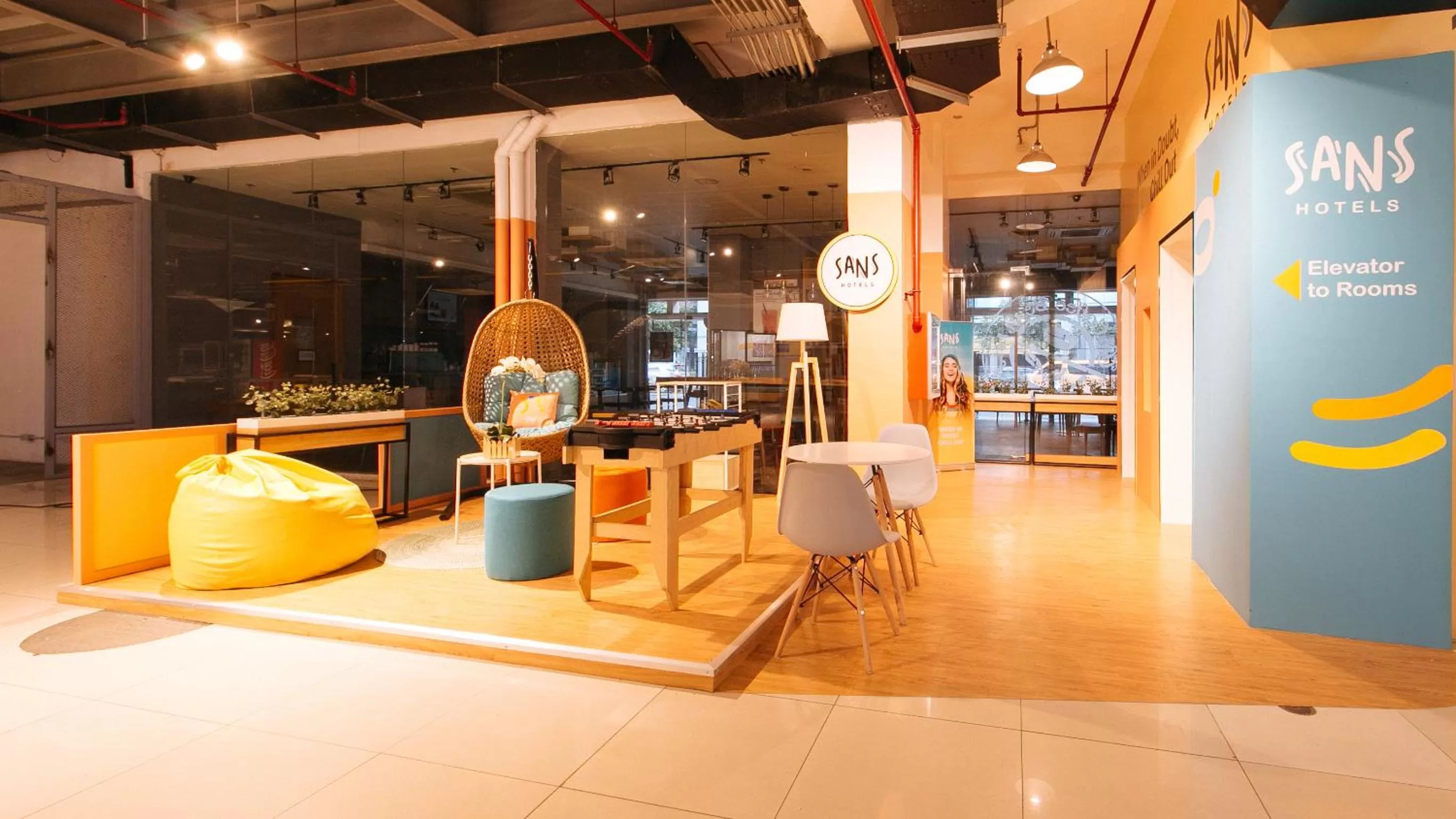 Seating area in Sans Hotel Laperal Manila