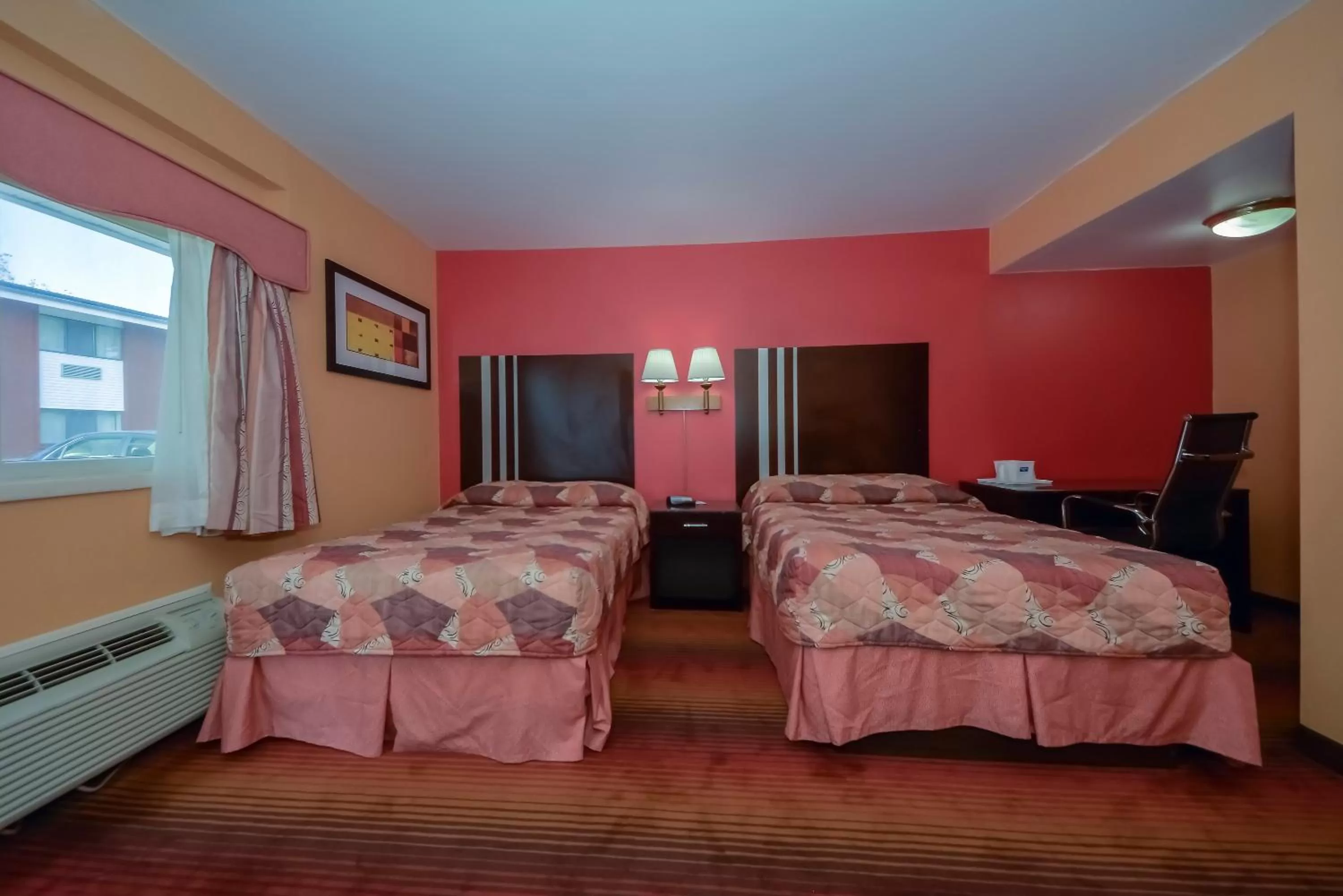 Bed in Rodeway Inn MacArthur Airport