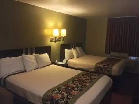 Bed in Americas Best Value Inn Caldwell