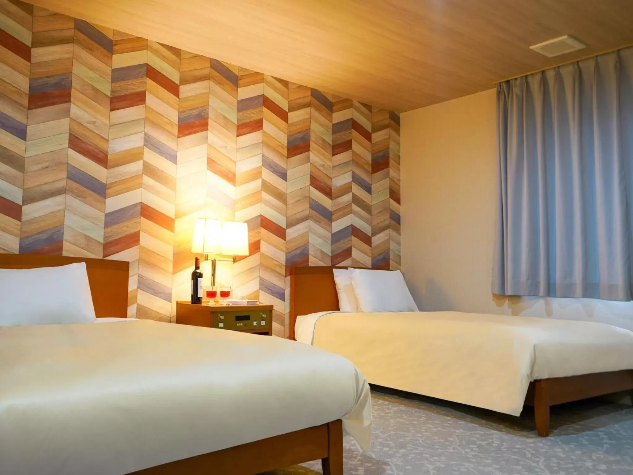 Photo of the whole room, Bed in Hotel New Gaea Iizuka