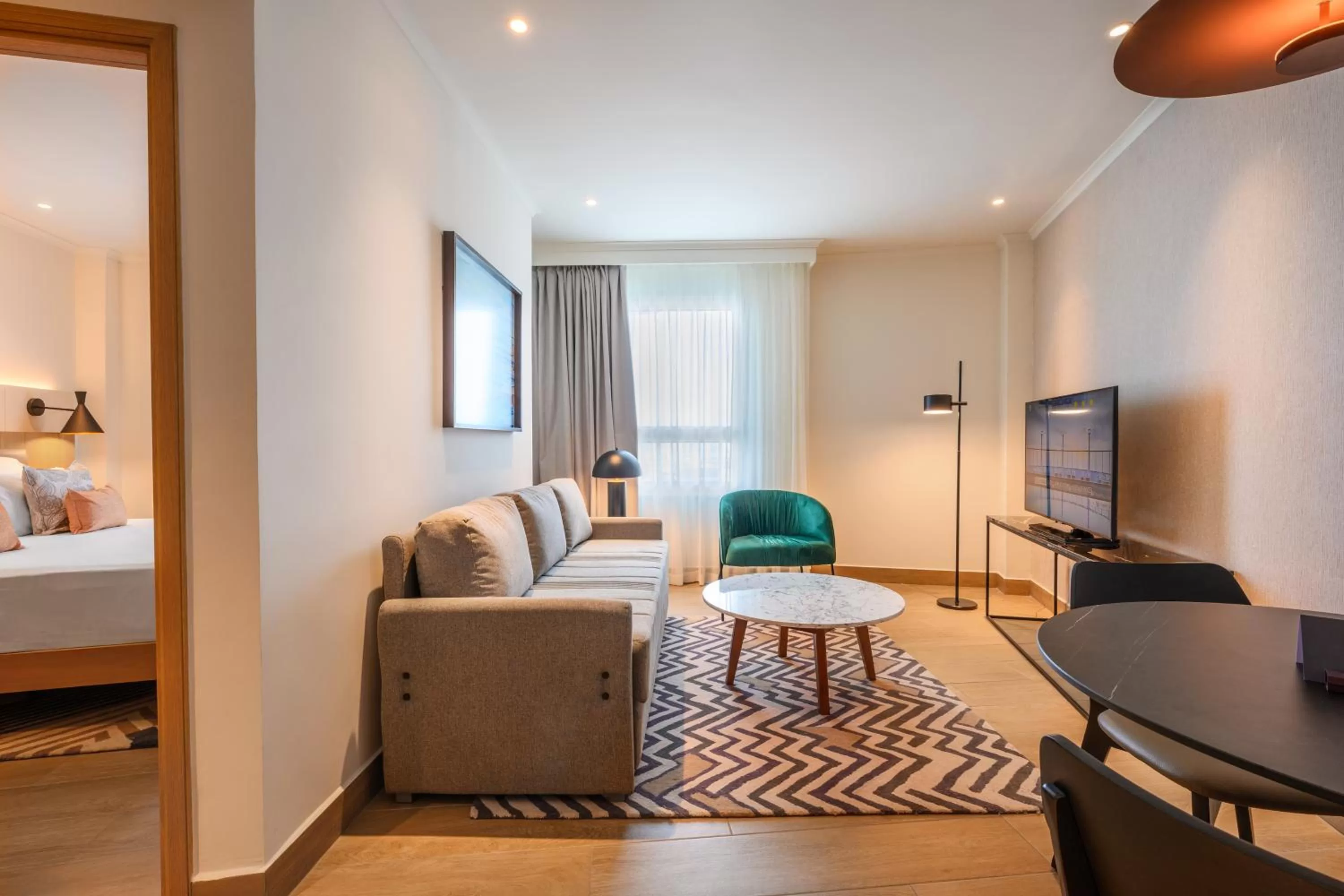 Living room in Sea Tower by Isrotel Design