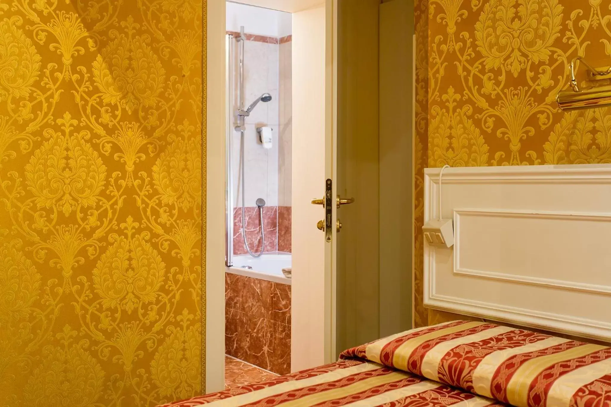 Bed, Bathroom in Residenza Goldoni