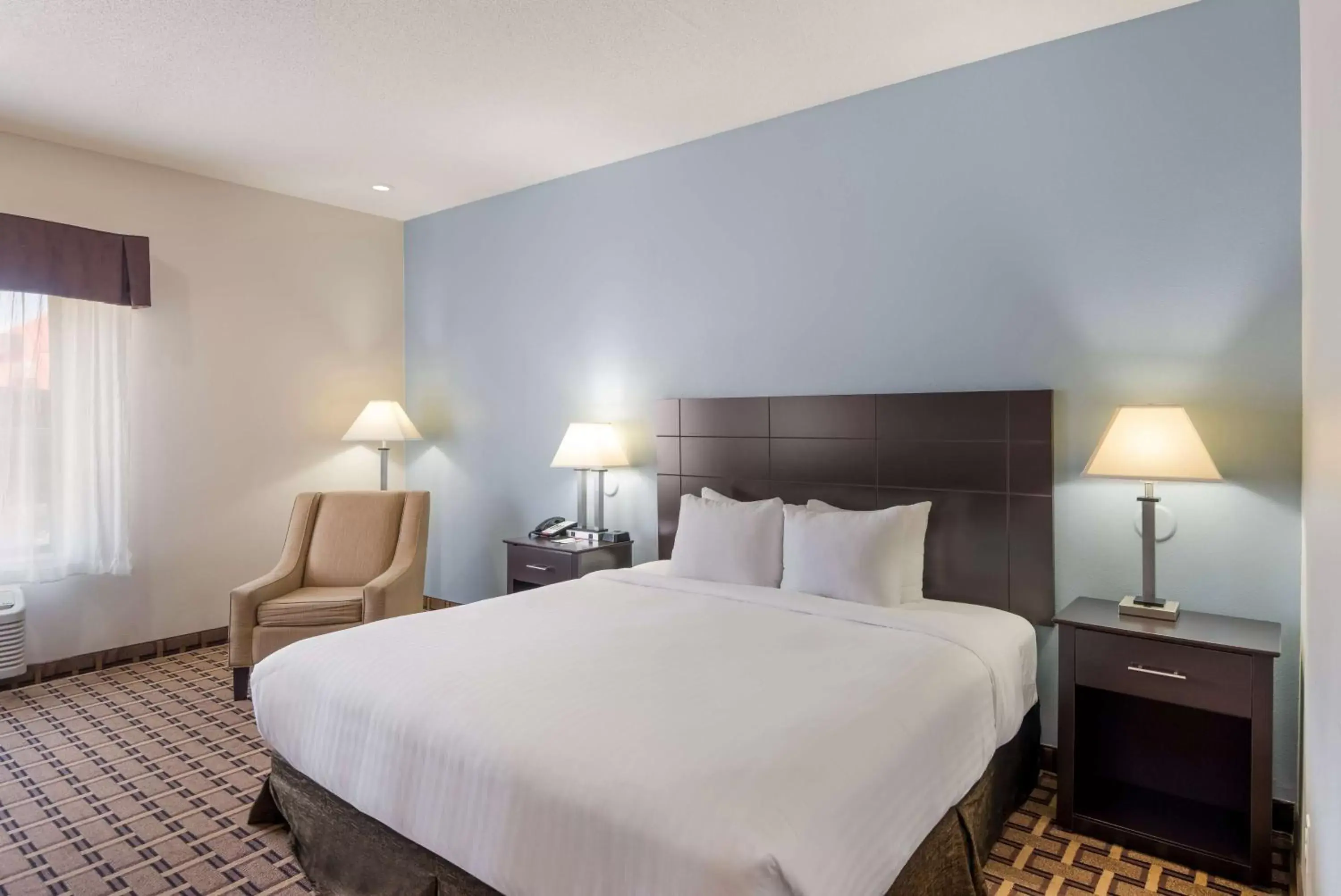 Bedroom, Bed in SureStay Plus Hotel by Best Western Coralville Iowa City