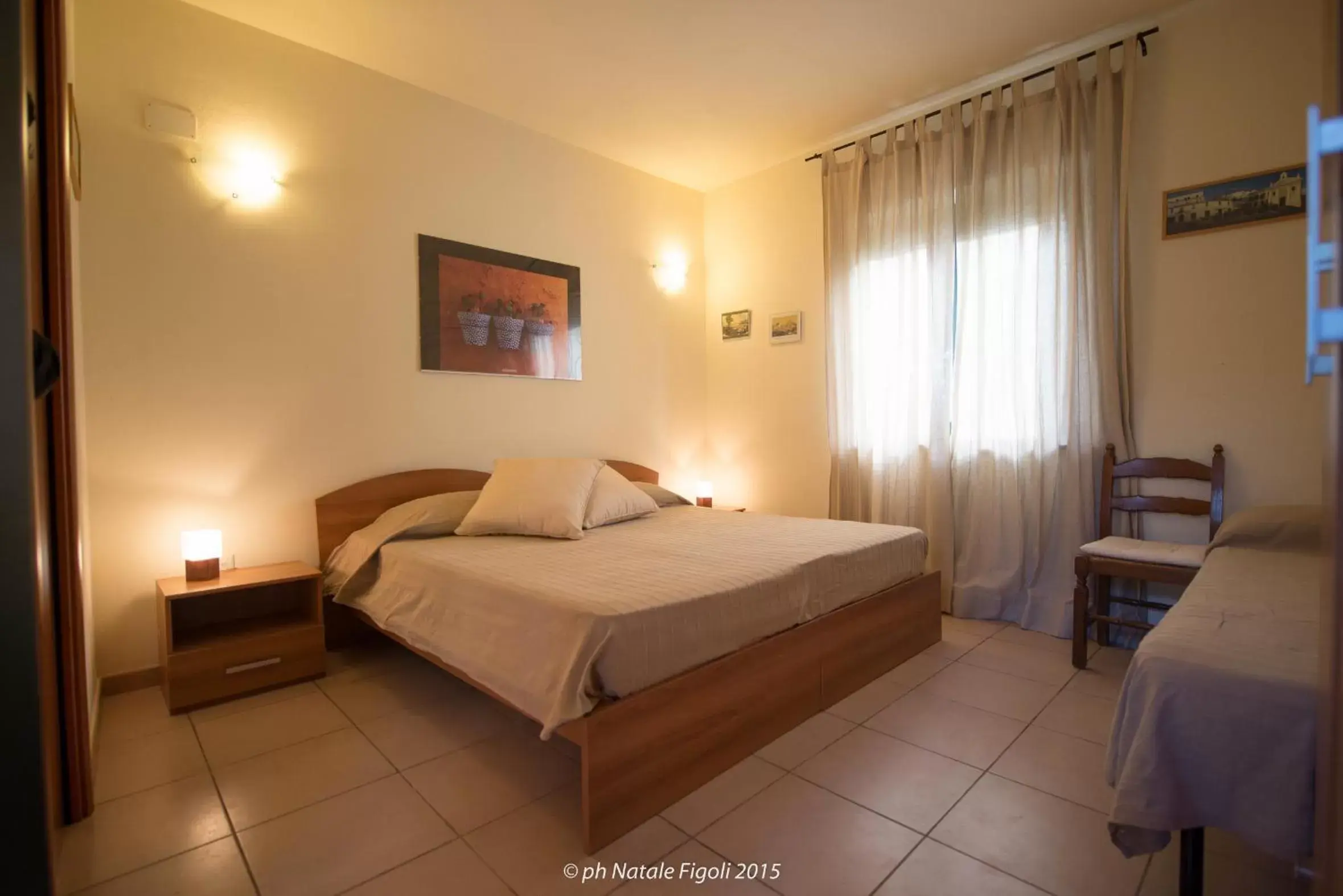 Photo of the whole room, Bed in La Piana degli Ulivi