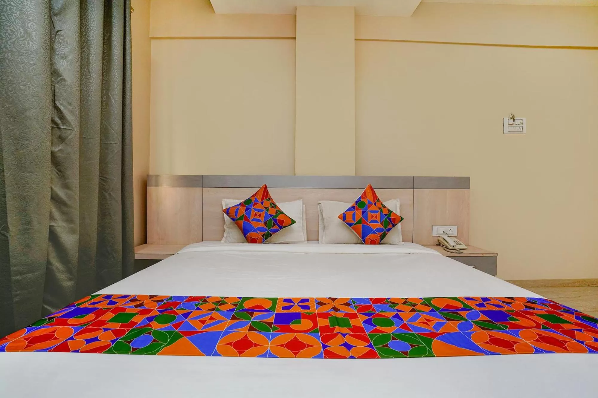 Bed in FabHotel Bhiwandi Palace