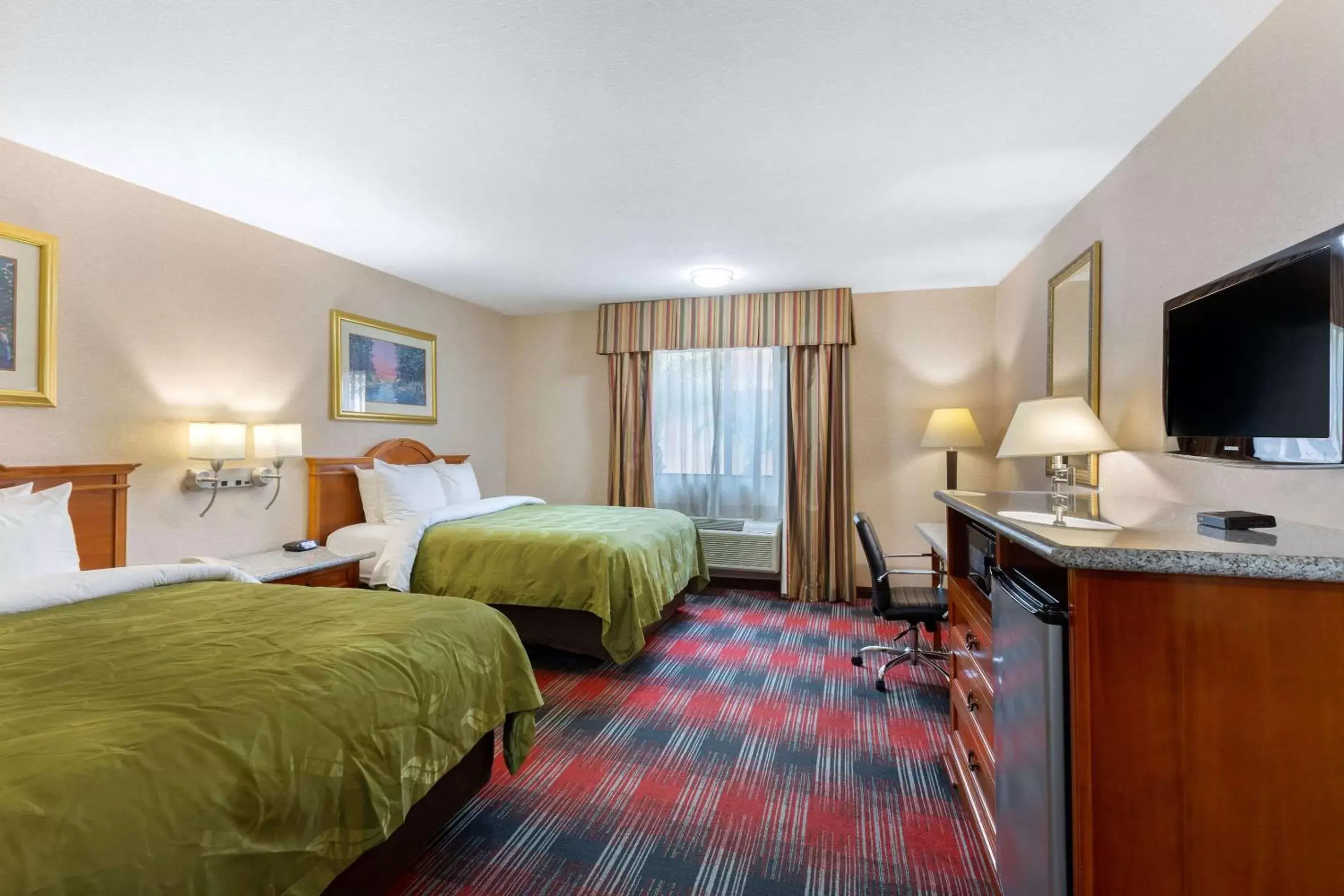 Photo of the whole room, TV/Entertainment Center in Quality Inn & Suites Oceanside Near Camp Pendleton