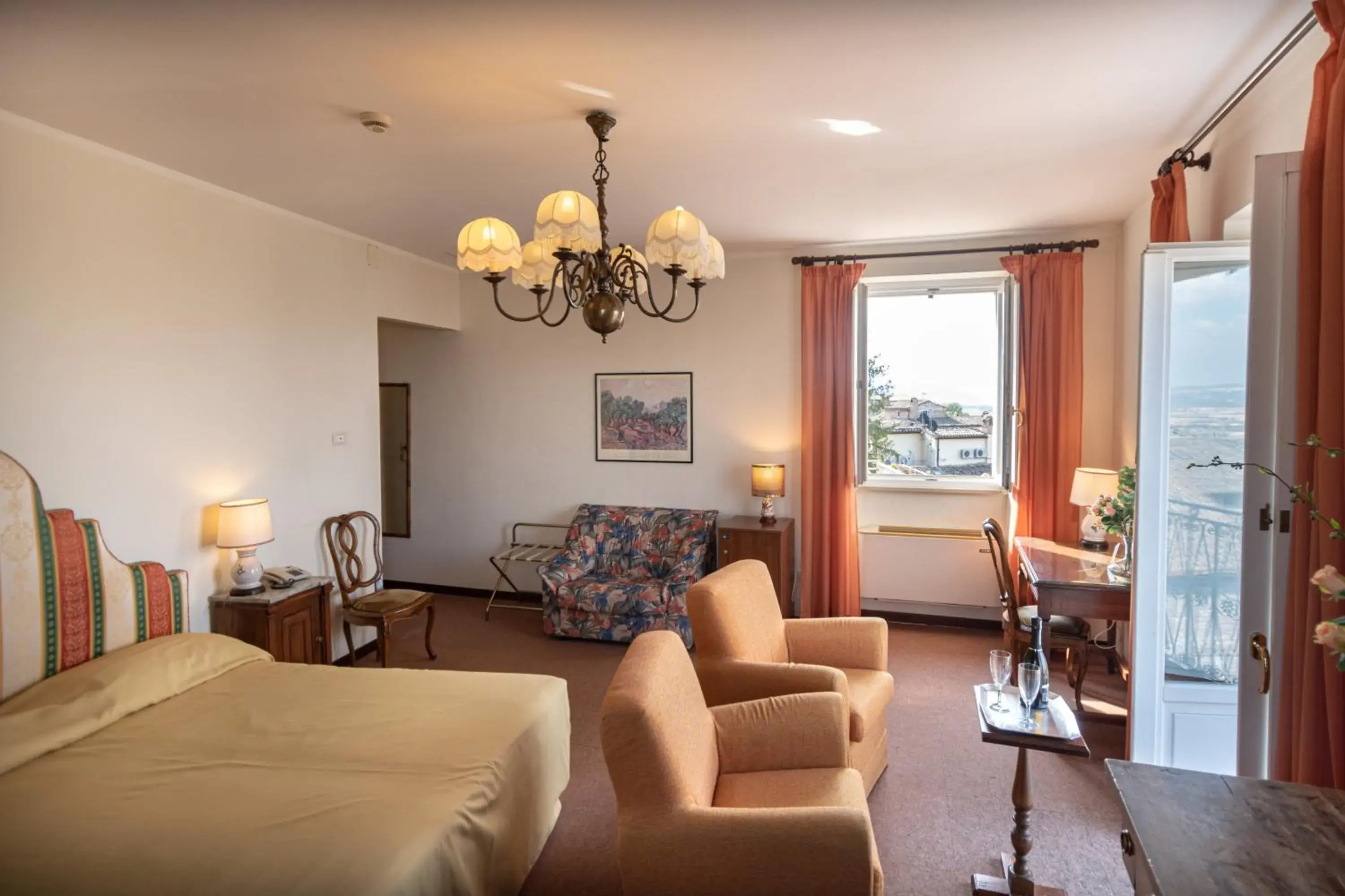 Bedroom, Seating Area in Hotel Umbra