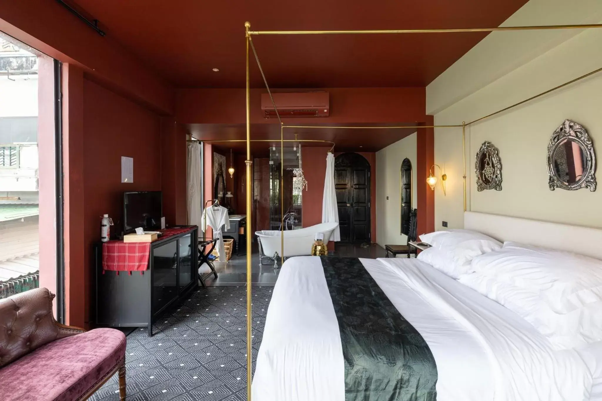 Bedroom in Amdaeng Bangkok Riverside Hotel - SHA Plus Certified