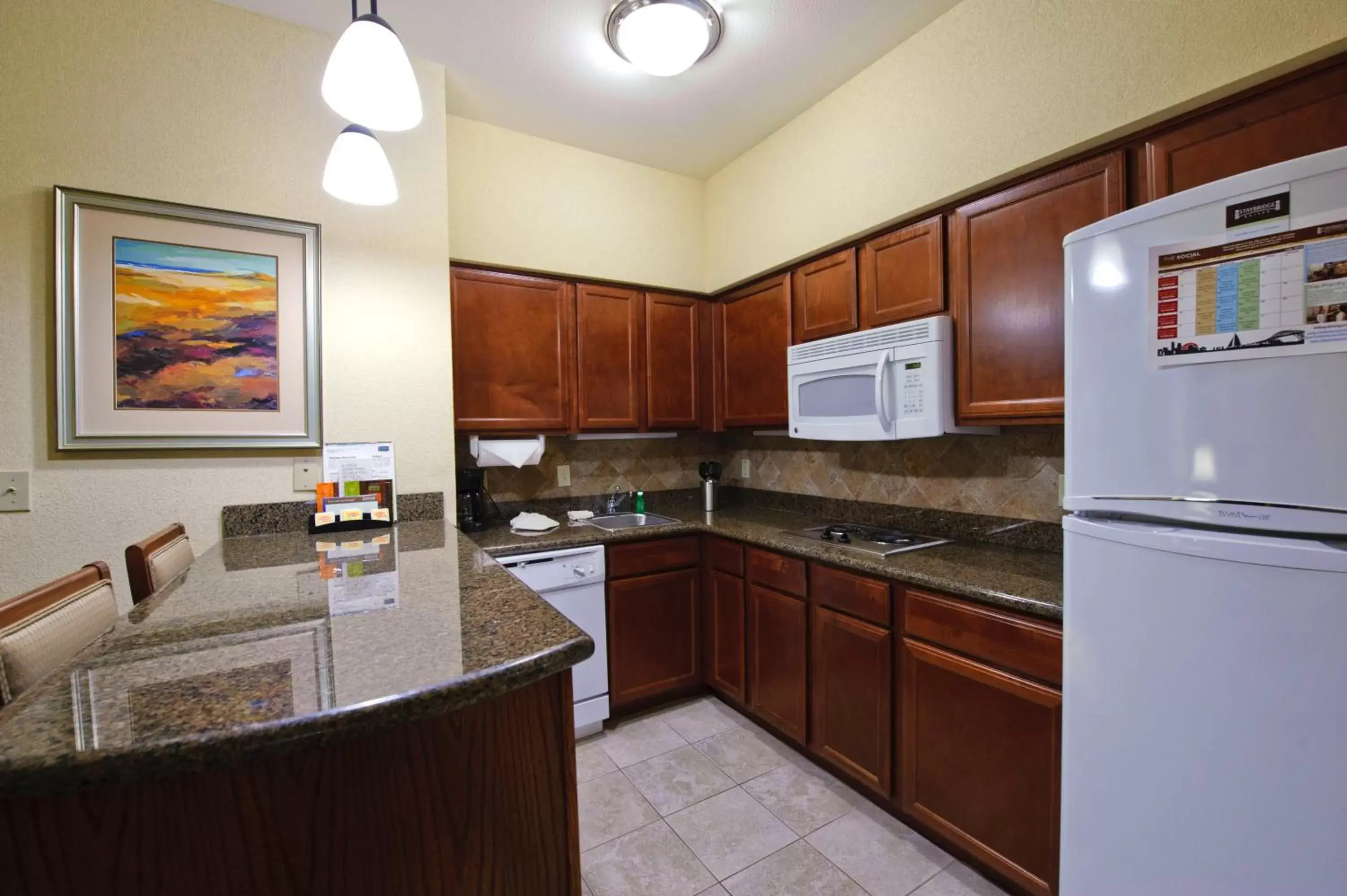 Photo of the whole room, Kitchen/Kitchenette in Staybridge Suites Corpus Christi, an IHG Hotel