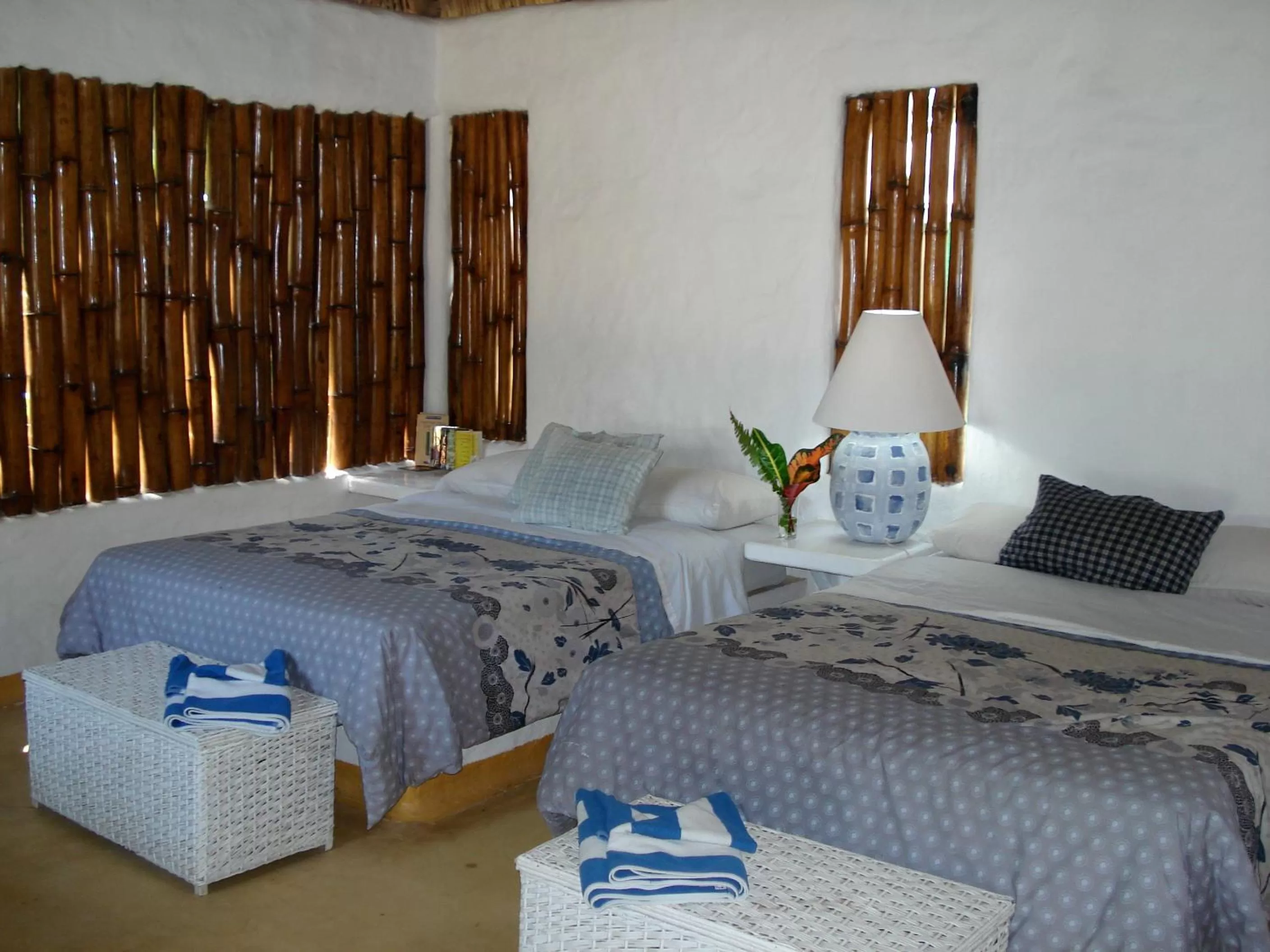 Bed in Junto al Rio Bungalows & Suites