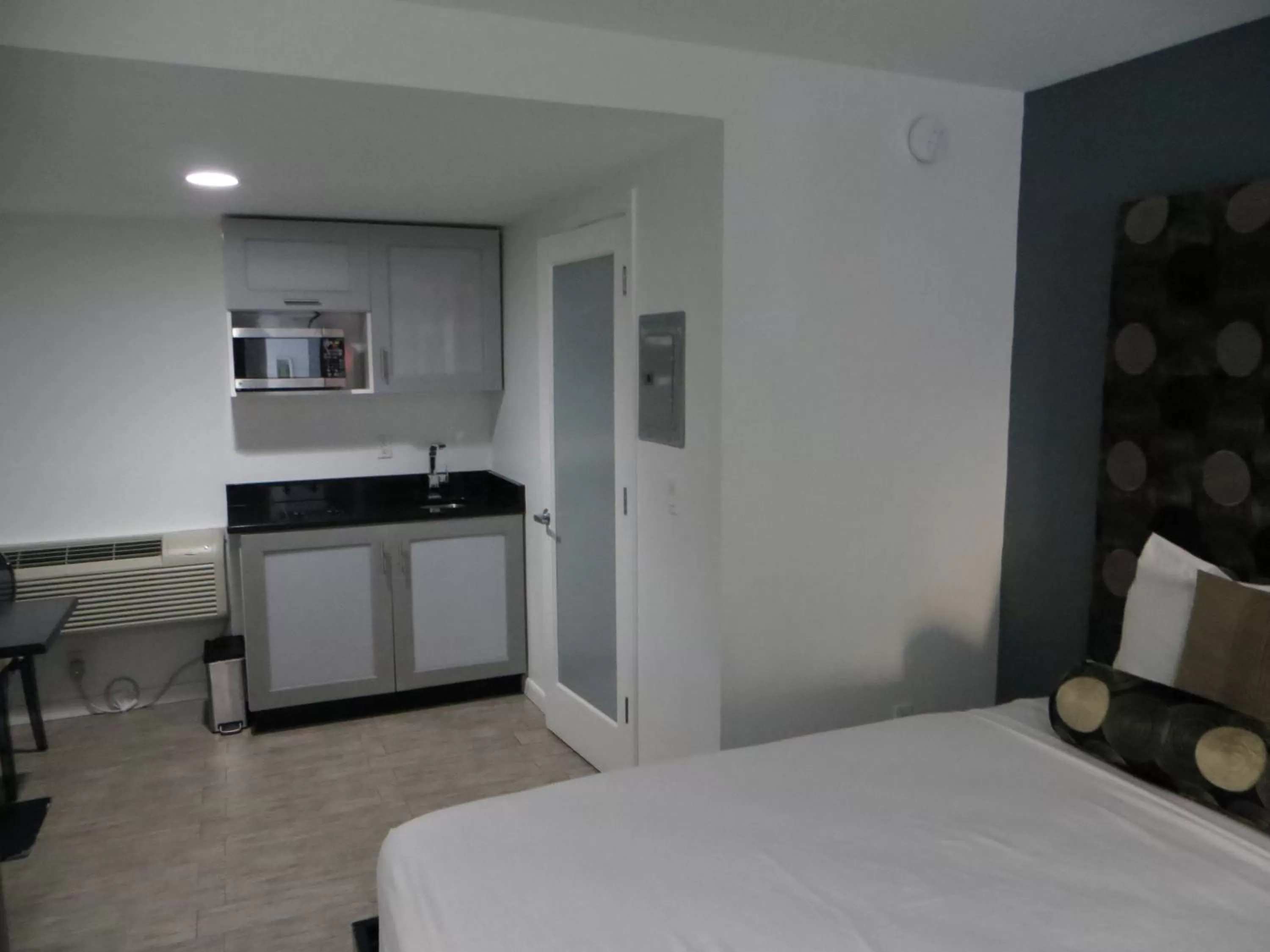 Decorative detail, Bed in Lotus Boutique Inn and Suites