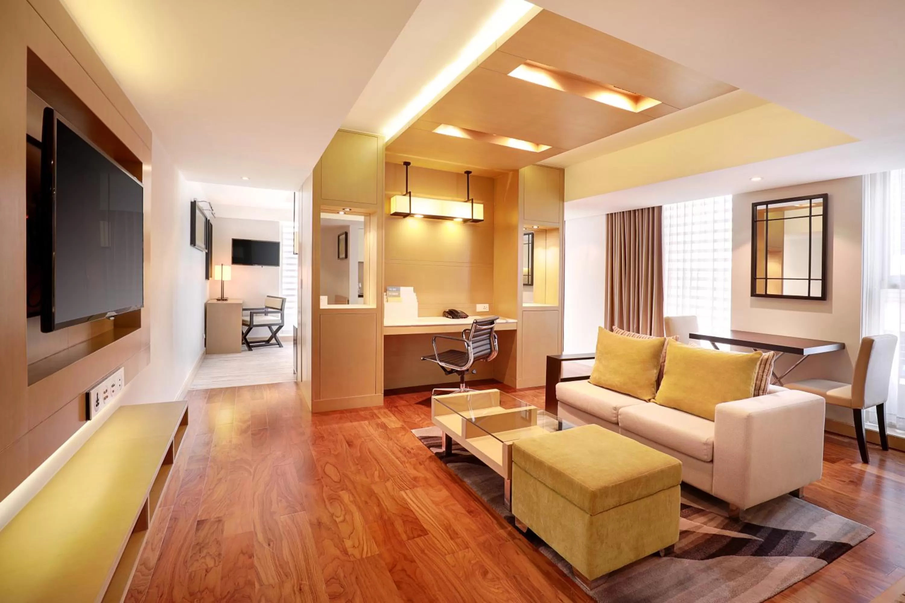 Communal lounge/ TV room in Crowne Plaza Dhaka Gulshan by IHG