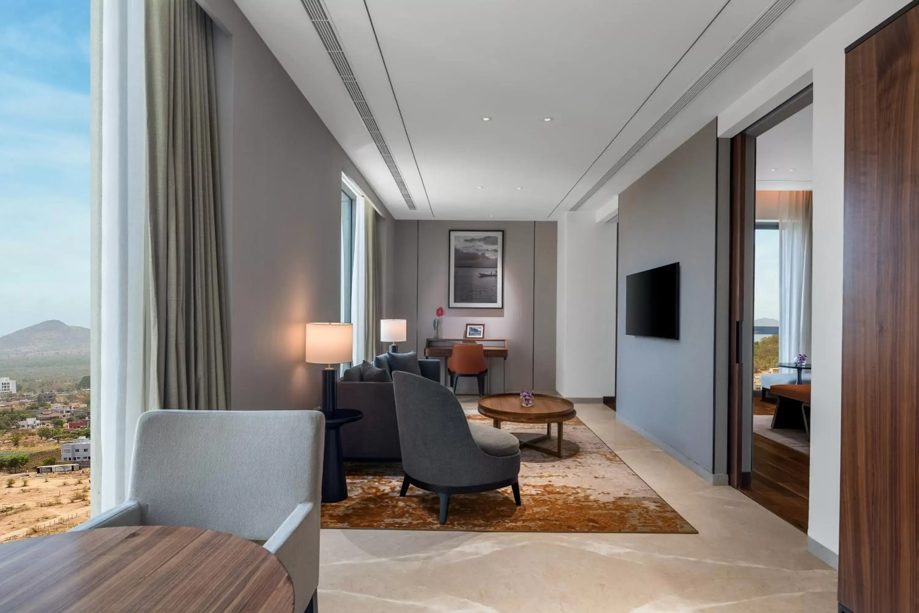 Living room, Seating Area in Radisson Blu Hotel & Spa, Nashik