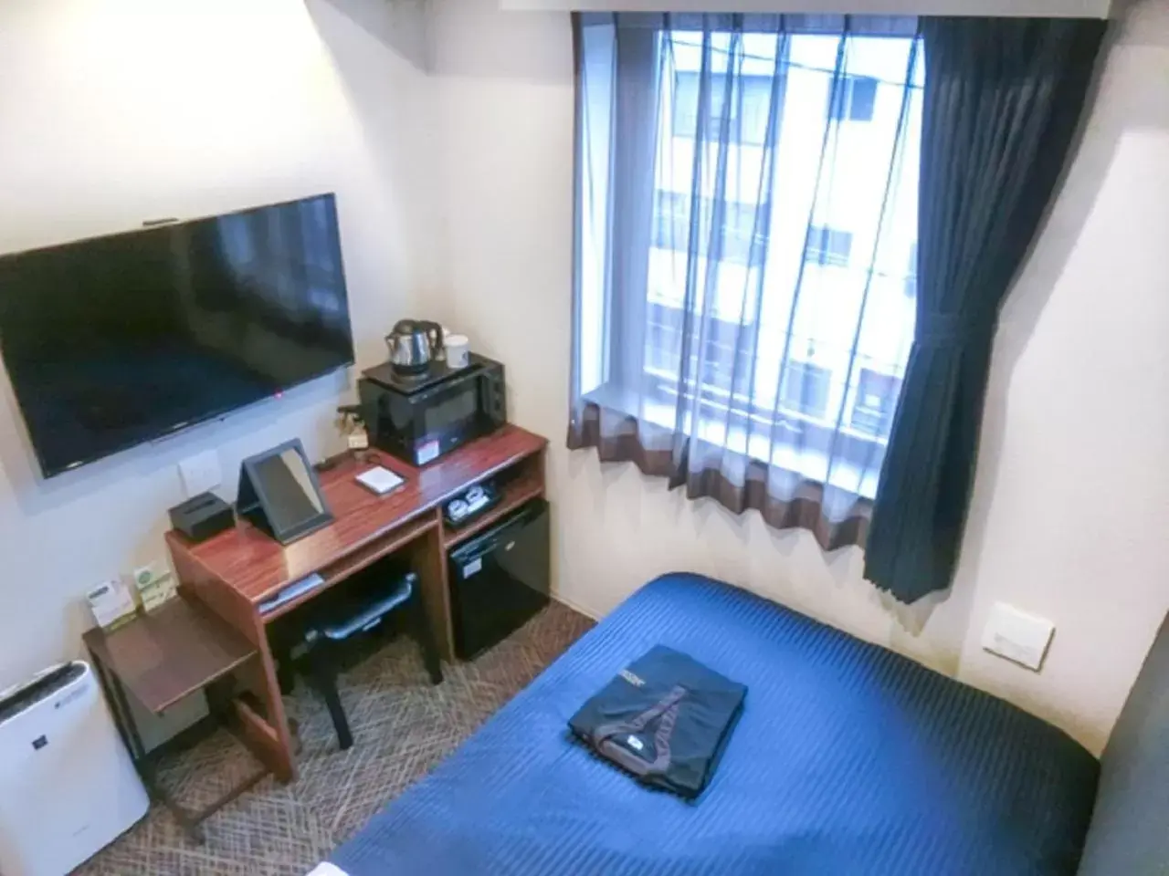Photo of the whole room, TV/Entertainment Center in Natural Hot Spring Hotel Livemax Premium Hiroshima