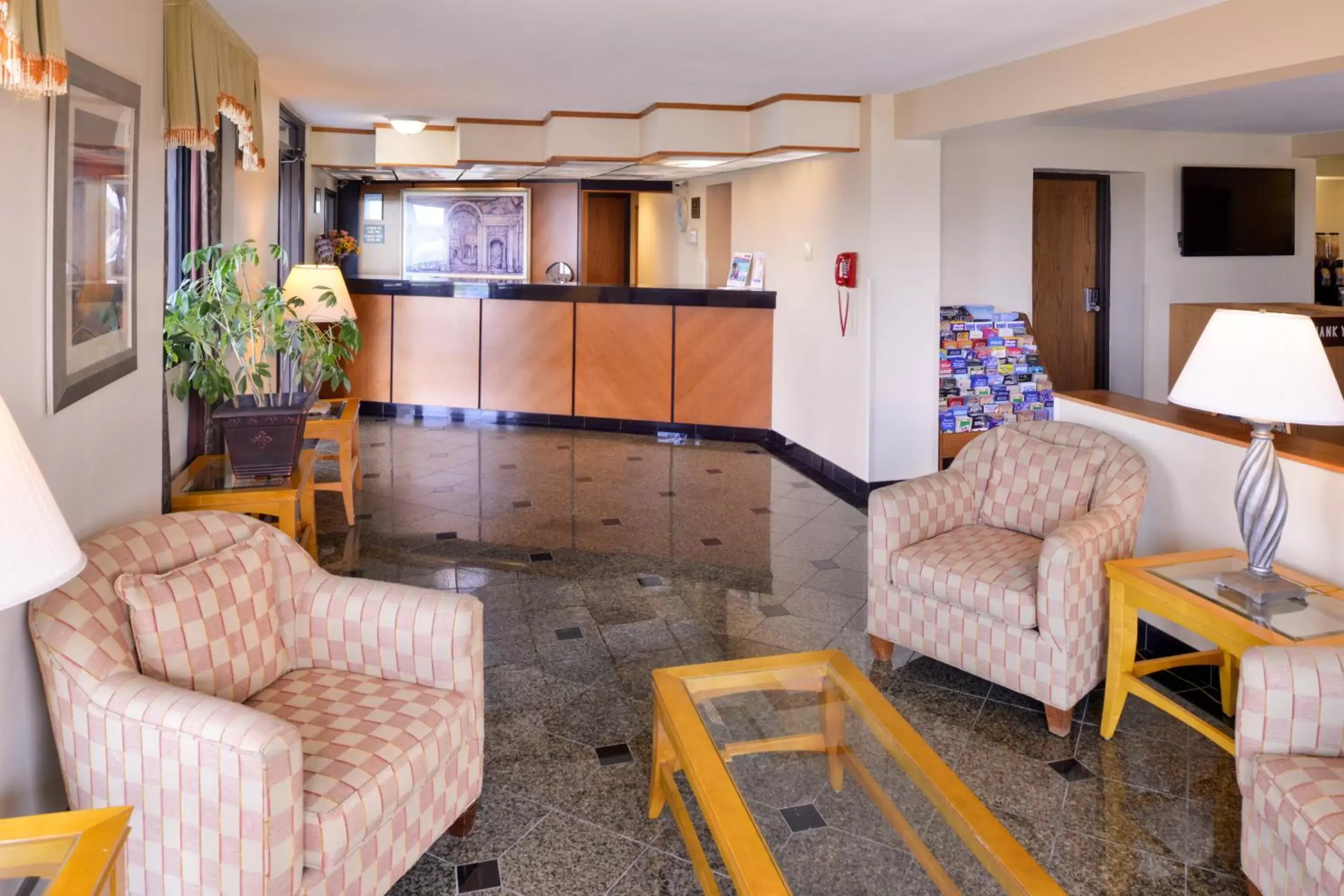Communal lounge/ TV room, Lobby/Reception in Americas Best Value Inn - Collinsville / St. Louis
