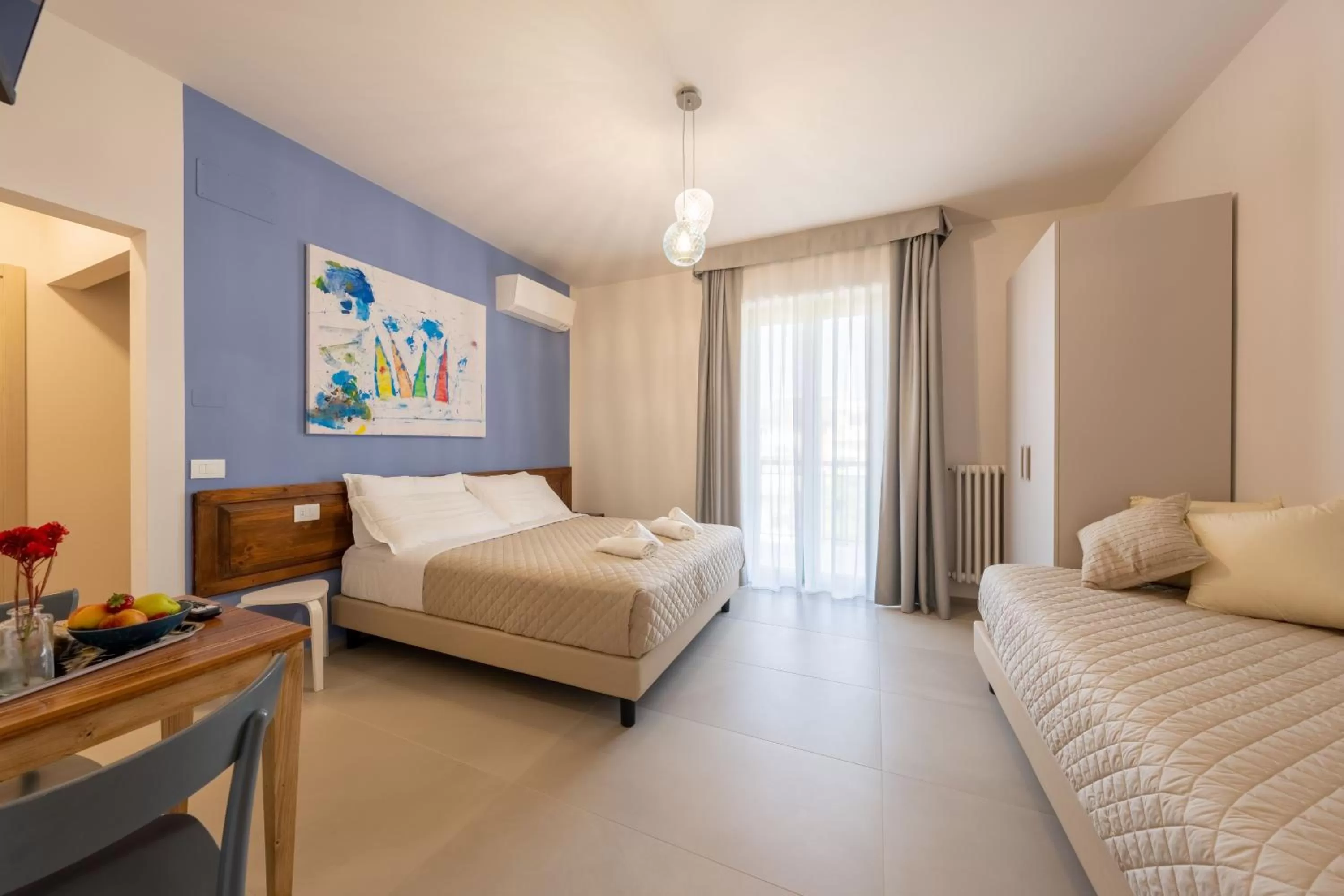 Photo of the whole room, Bed in Dea Suite Room