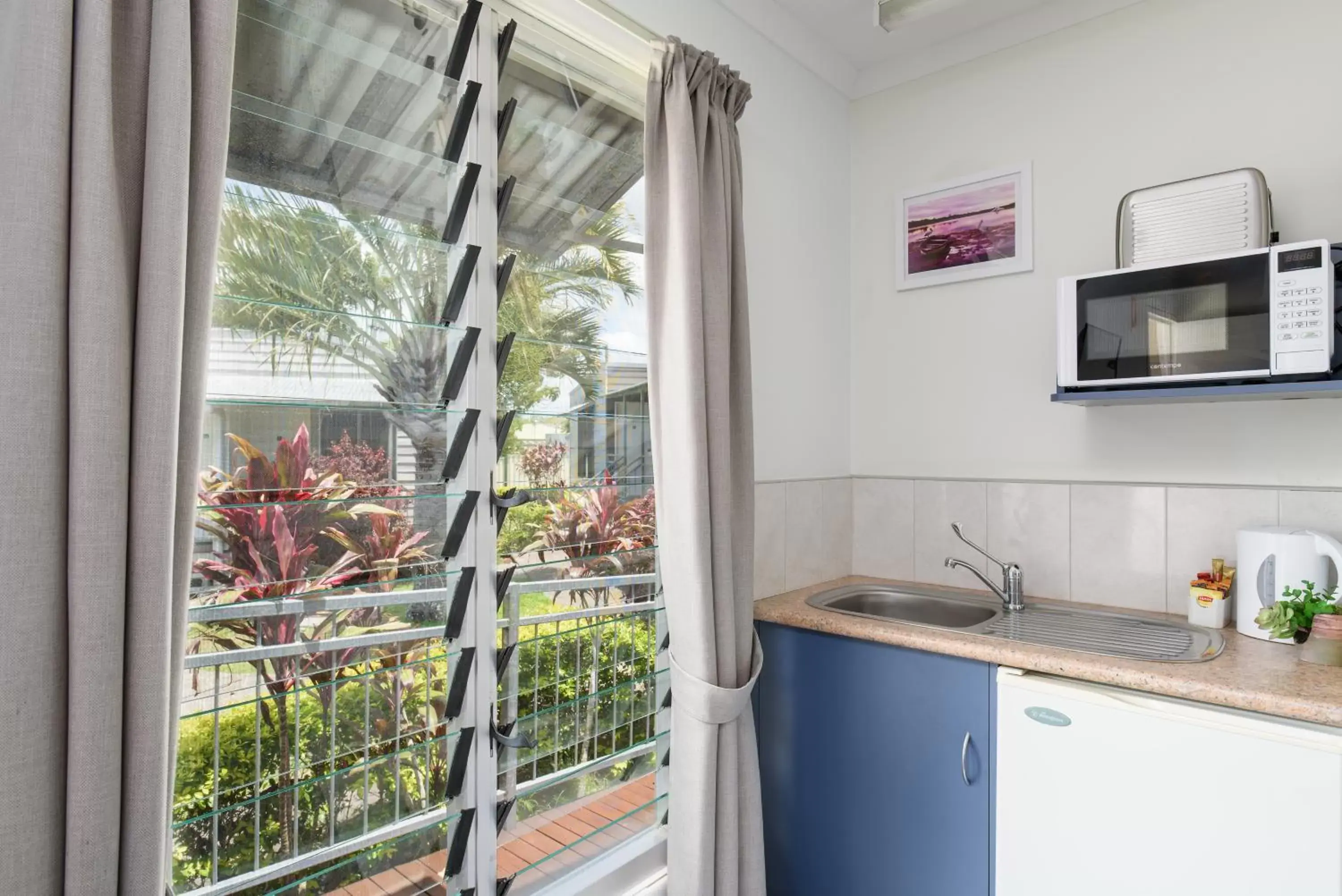 Kitchen or kitchenette, Kitchen/Kitchenette in Tin Can Bay's Sleepy Lagoon Motel