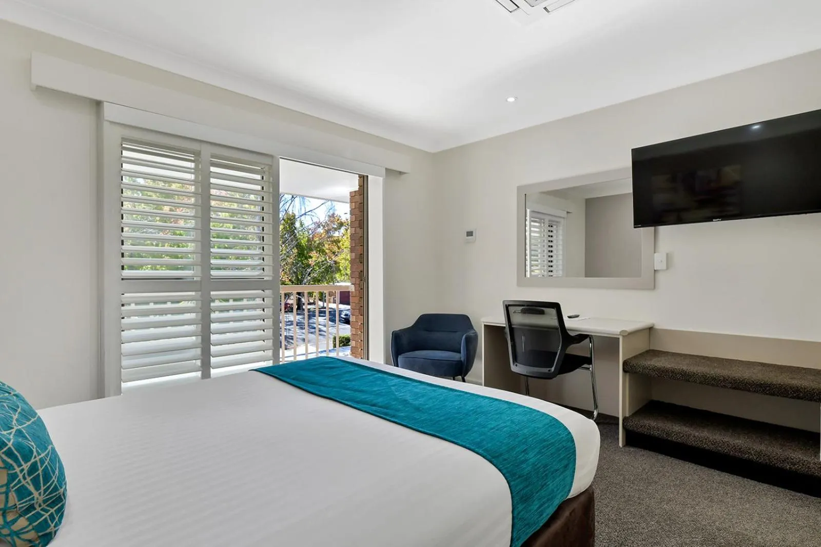 Bed in Central Caleula Motor Lodge