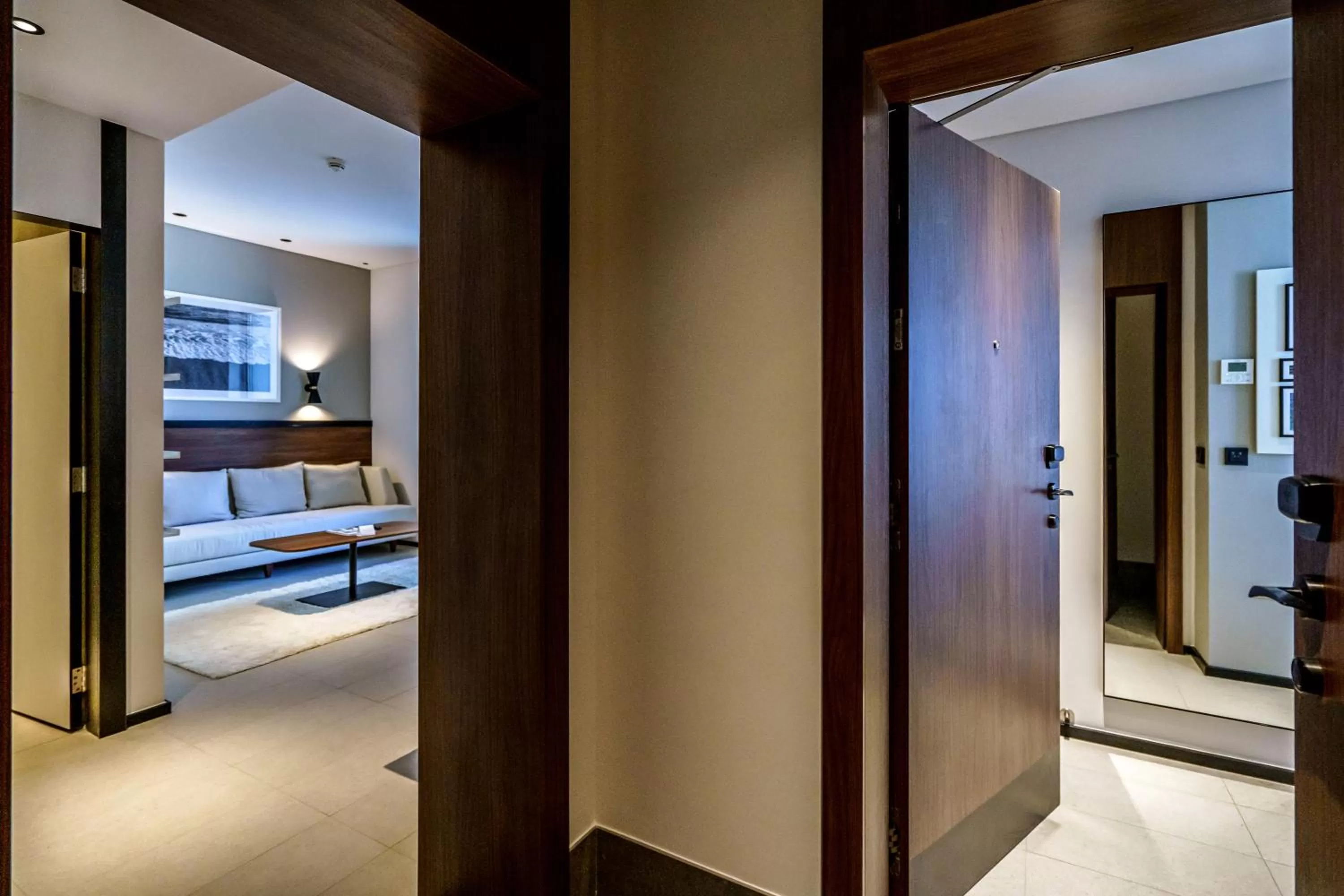 Living room, Bed in FORM Hotel Al Jaddaf, Dubai, a Member of Design Hotels