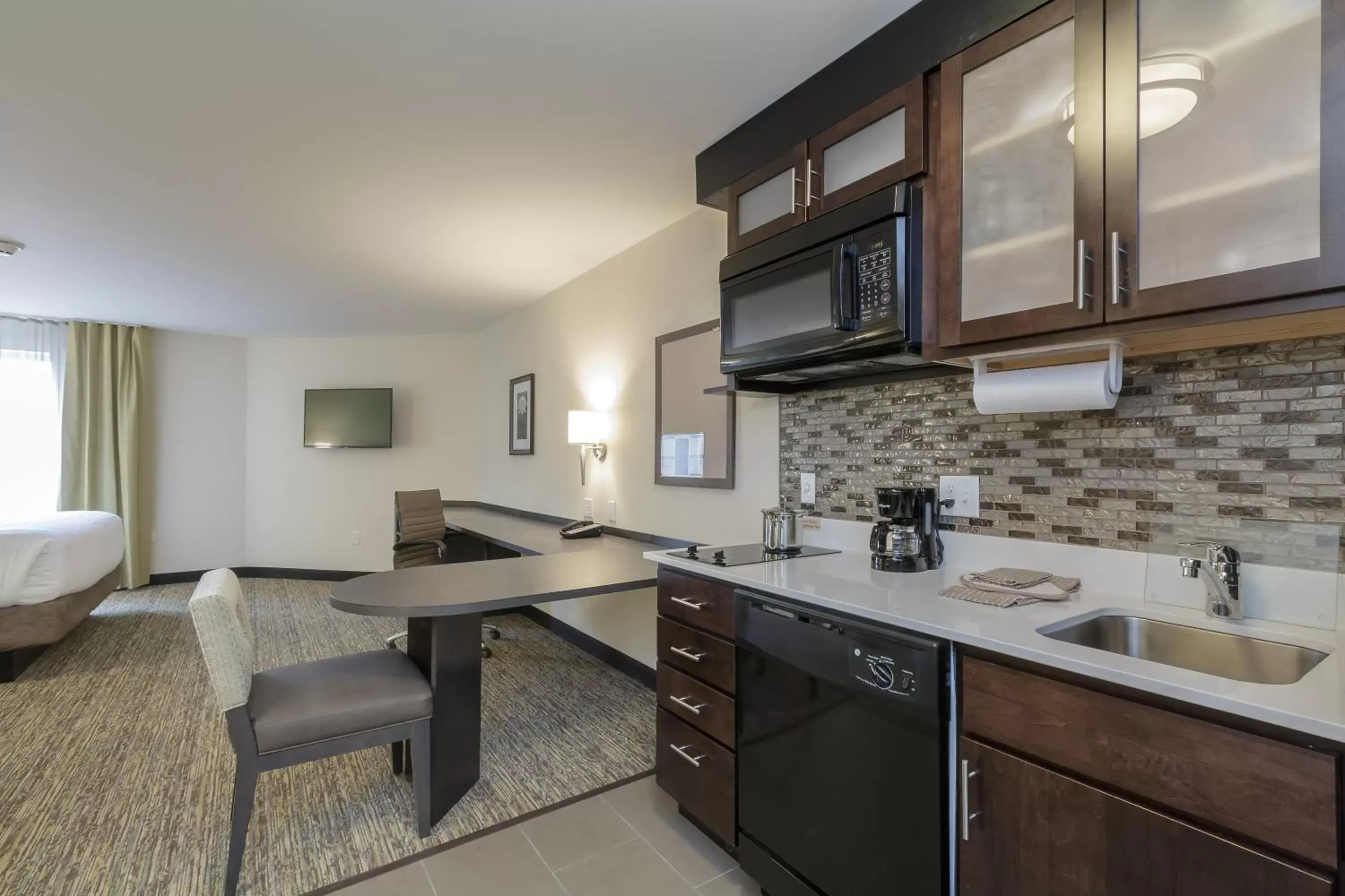 Photo of the whole room, Kitchen/Kitchenette in Candlewood Suites Mishawaka, an IHG Hotel