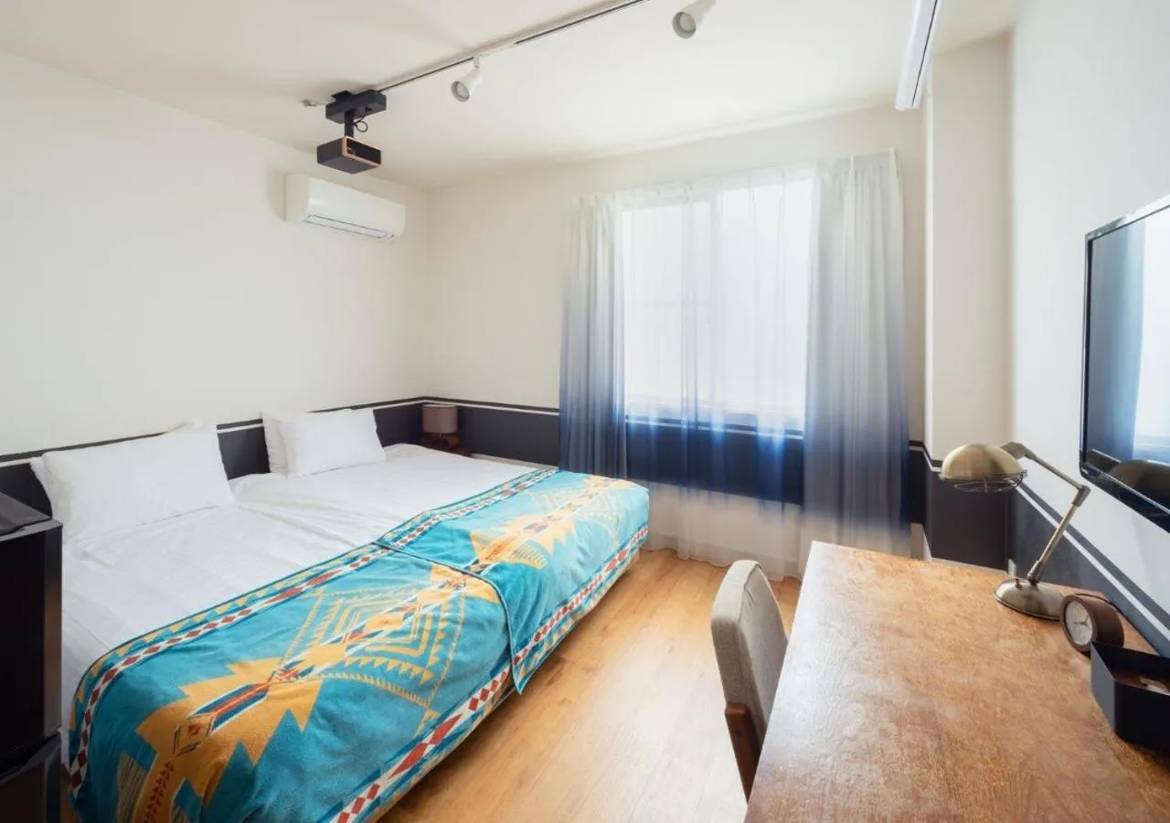 TV and multimedia, Bed in Hotel Graphy Nezu